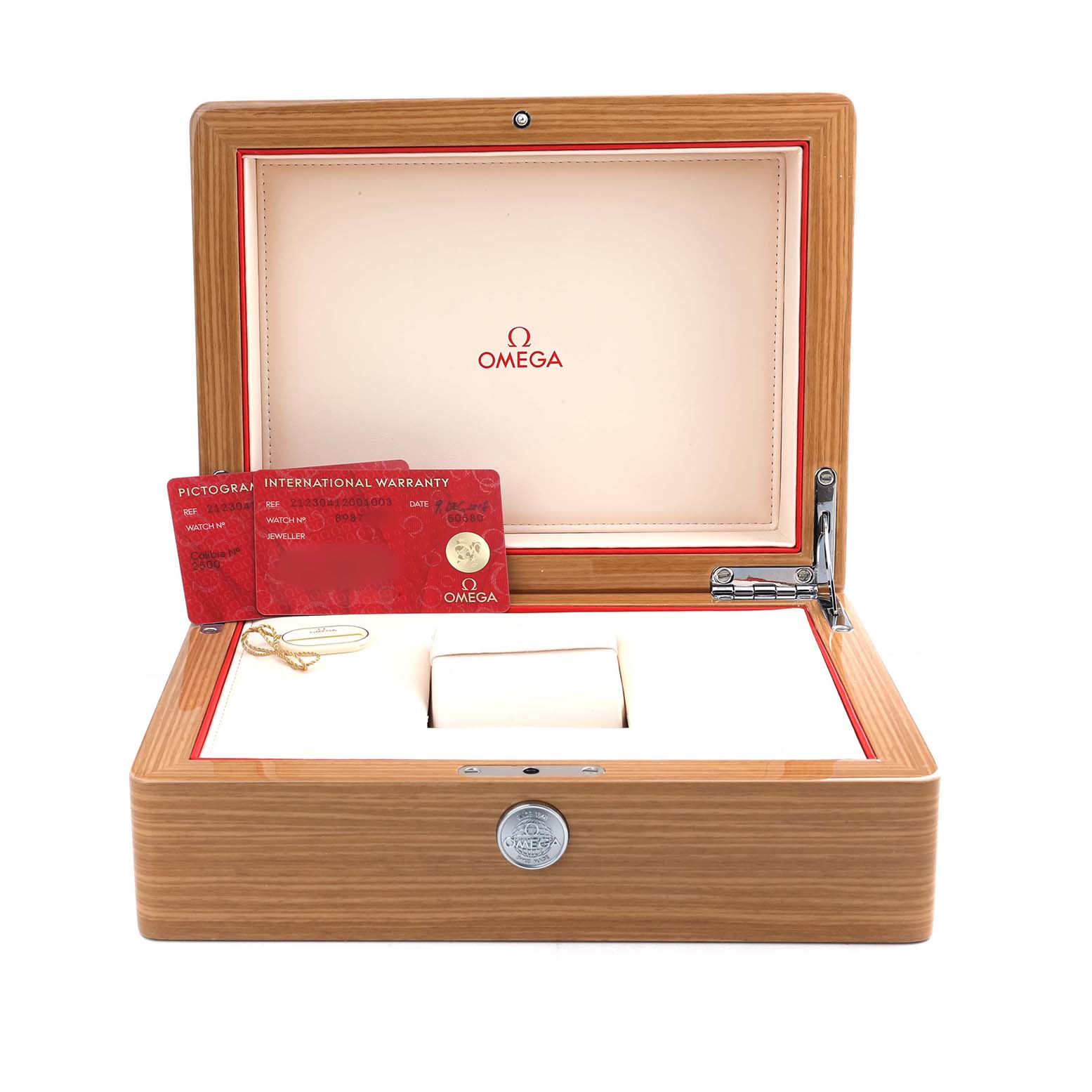 The image shows an open Omega Seamaster 212.30.41.20.01.003 Men's Stainless Steel Black Dial watch box with warranty and pictogram cards inside.