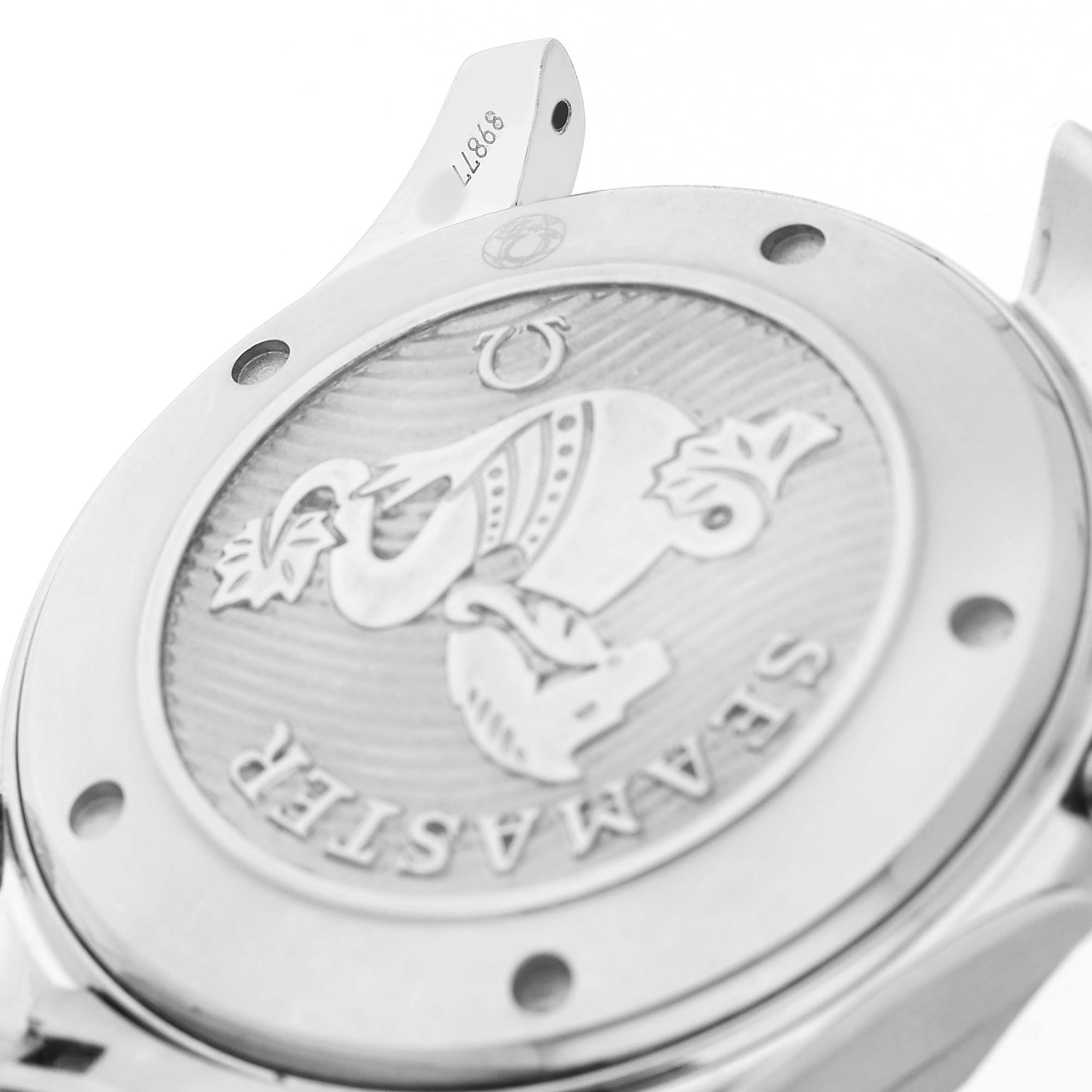 The image shows the engraved case back of an Omega Seamaster 212.30.41.20.01.003 Men's Stainless Steel Black Dial watch, viewed at an angle highlighting its detailed design.