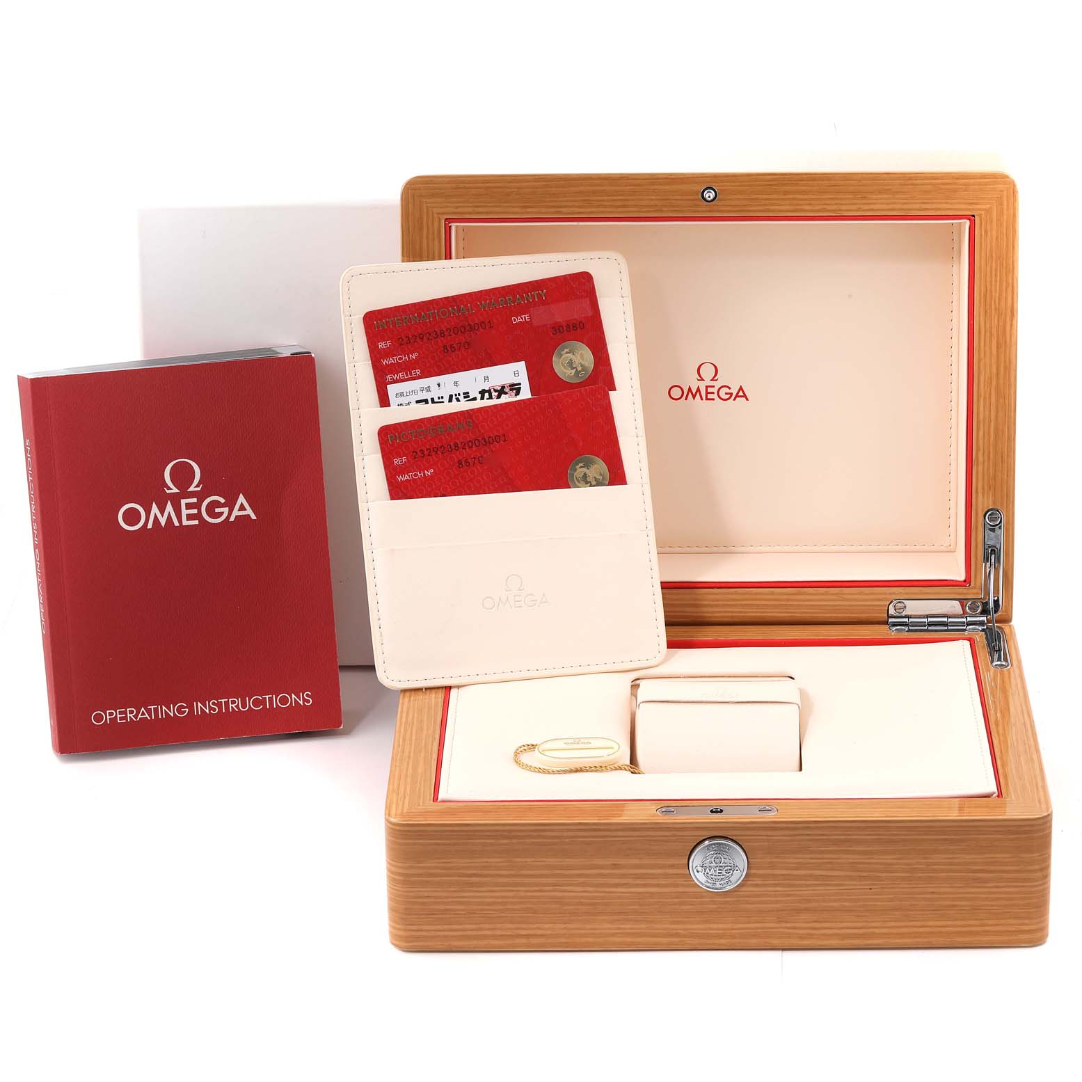 The image shows the packaging, warranty cards, and operating instructions for an Omega Planet Ocean 232.92.38.20.03.001 Men
s Titanium Blue Dial 232.92.38.20.03.001 Men
s Titanium Blue Dial watch.