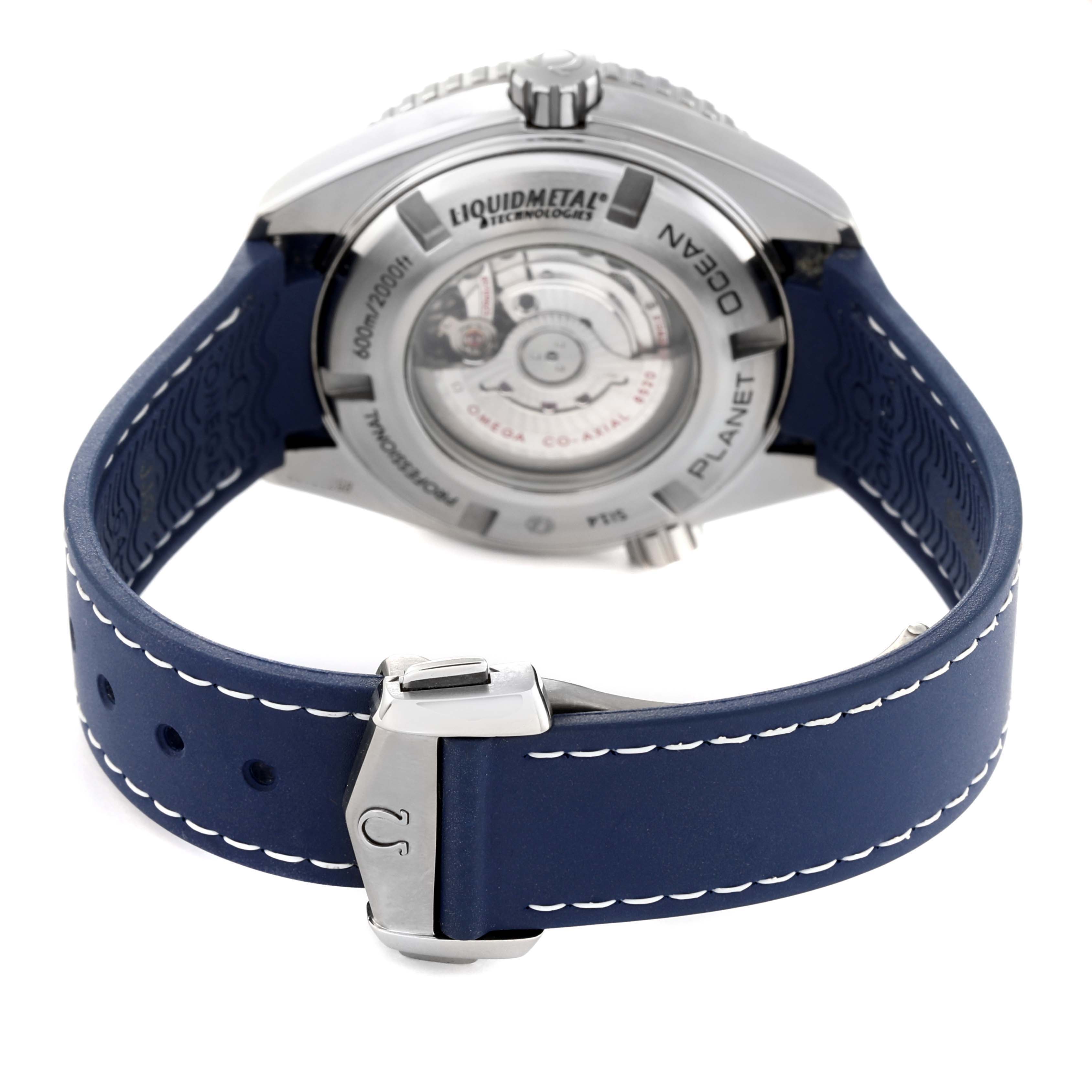 The image shows the back view of the Omega Planet Ocean 232.92.38.20.03.001 Men
s Titanium Blue Dial 232.92.38.20.03.001 Men
s Titanium Blue Dial watch, highlighting the back case and blue strap with its clasp.