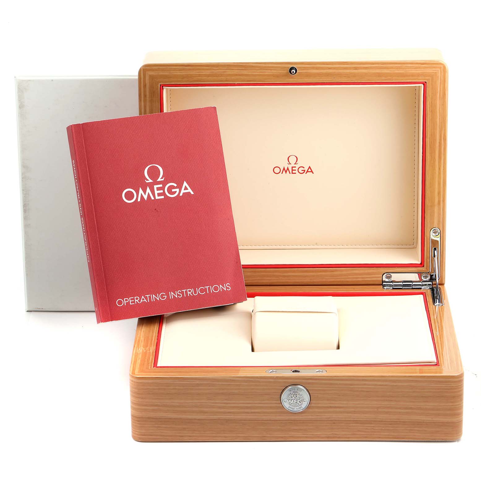 The image shows an Omega Speedmaster 311.30.42.30.13.001 Men's Stainless Steel Brown Dial 311.30.42.30.13.001 Men's Stainless Steel Brown Dial watch's wooden box, along with its operating instructions booklet and cushion inside.