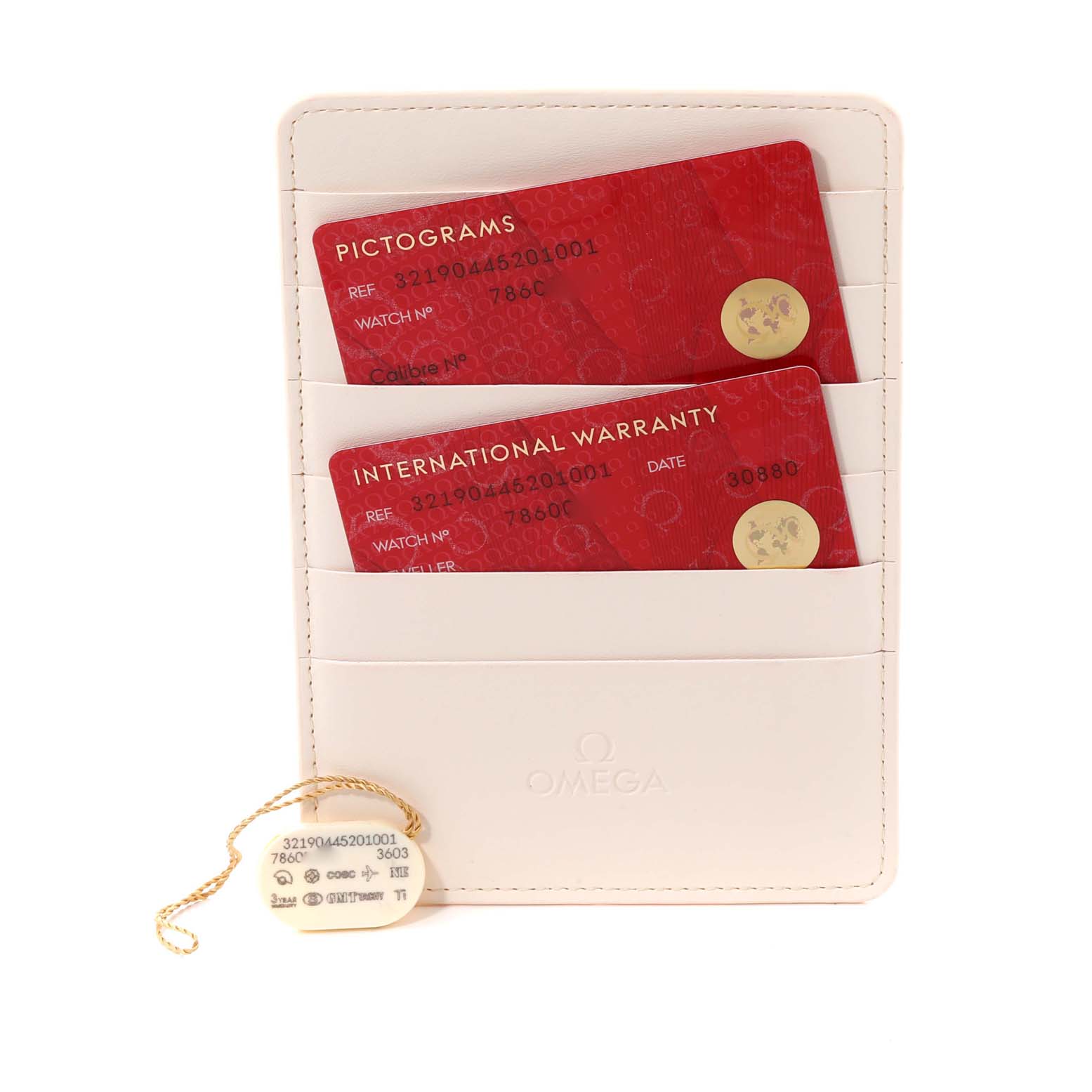 The image shows the warranty cards and a tag for an Omega Speedmaster 321.90.44.52.01.001 Men
s Titanium Black Dial 321.90.44.52.01.001 Men
s Titanium Black Dial watch placed in a white cardholder.