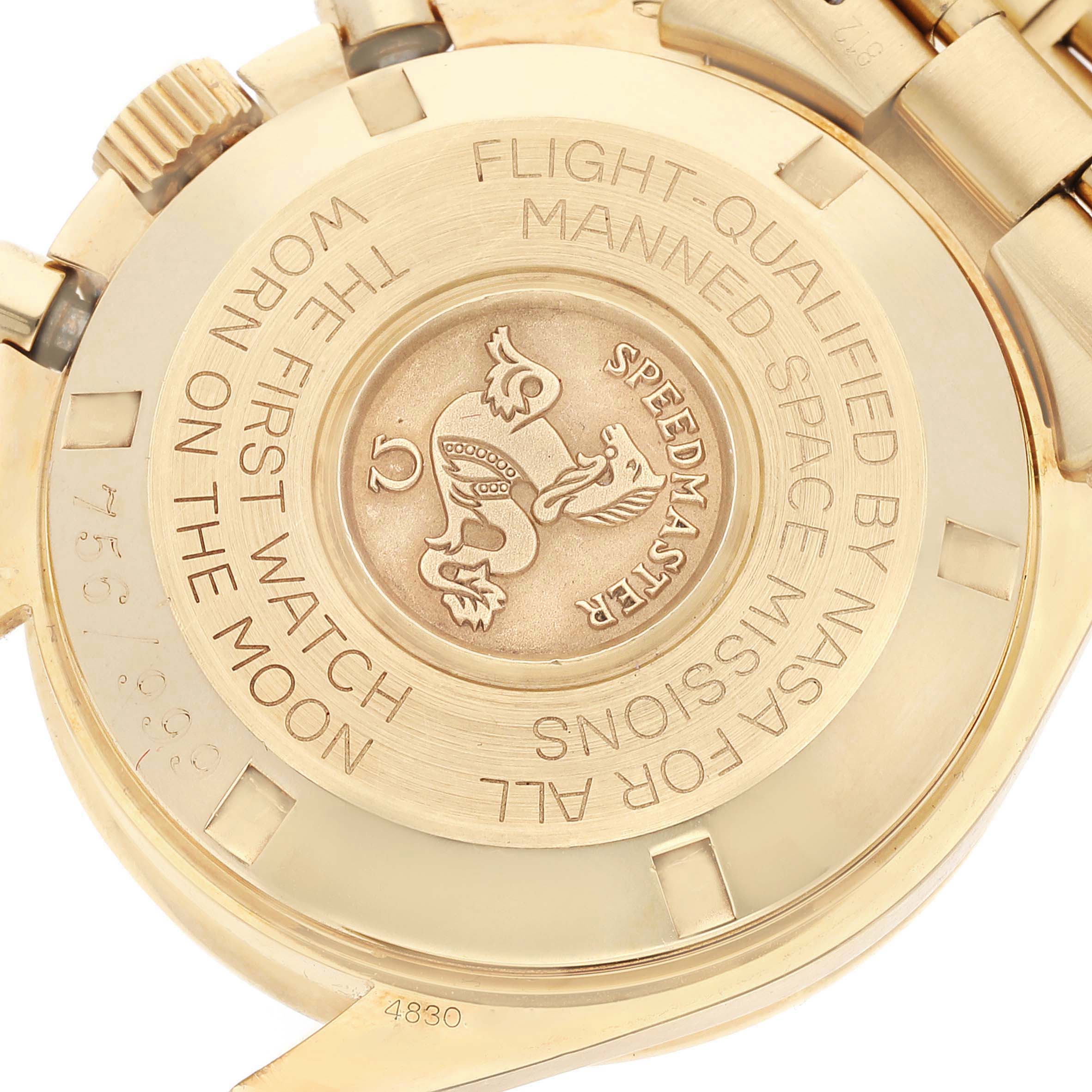 The image shows the back casing of an Omega Speedmaster 3191.50 Men's Yellow Gold Black Dial 3191.50 Men's Yellow Gold Black Dial watch, highlighting the engraved details and emblem.