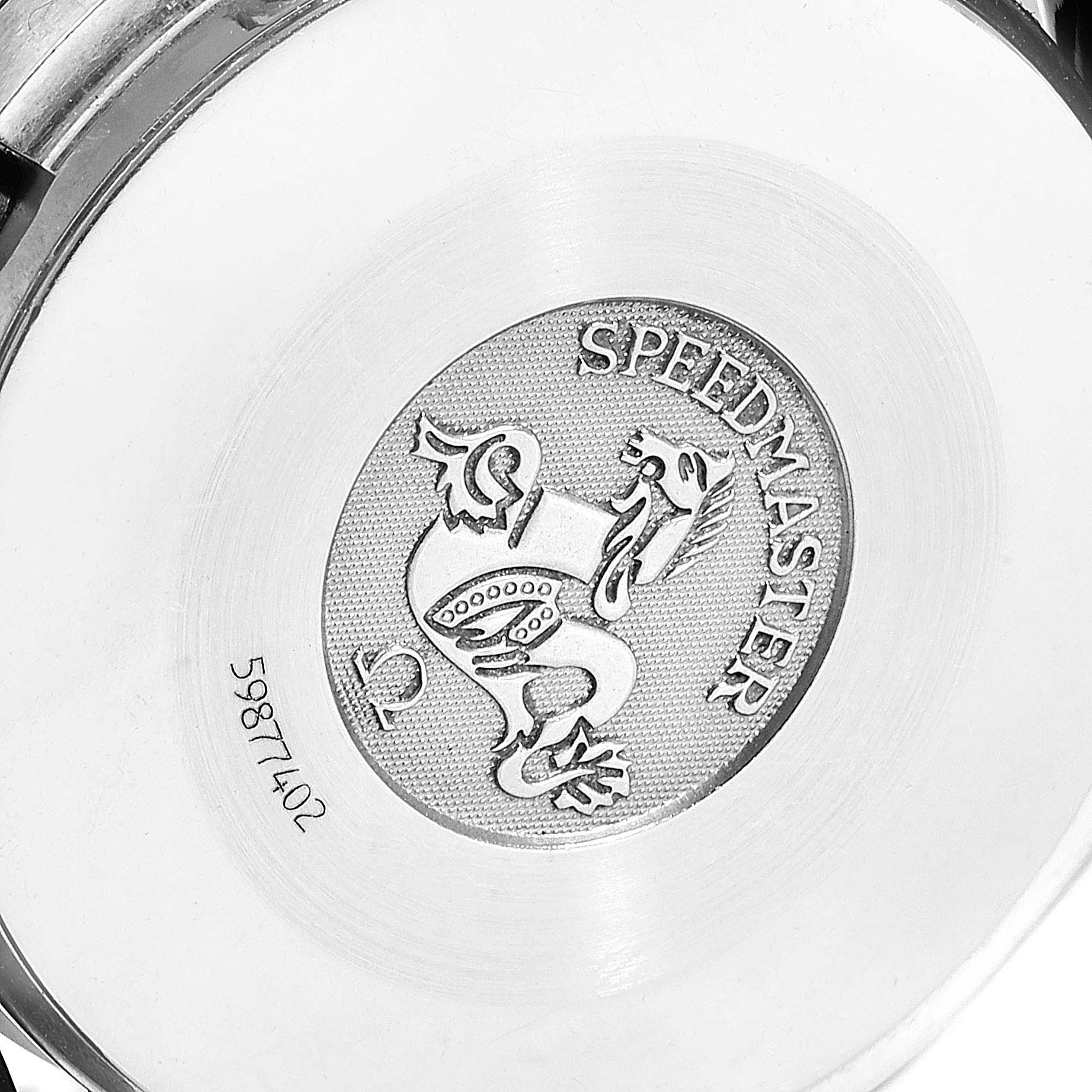 The image shows the case back of the Omega 3815.79.40 Women's Stainless Steel Mother of Pearl Dial 3815.79.40 Women's Stainless Steel Mother of Pearl Dial Speedmaster MOP Diamond Red Strap Ladies Watch 3815.79.40.