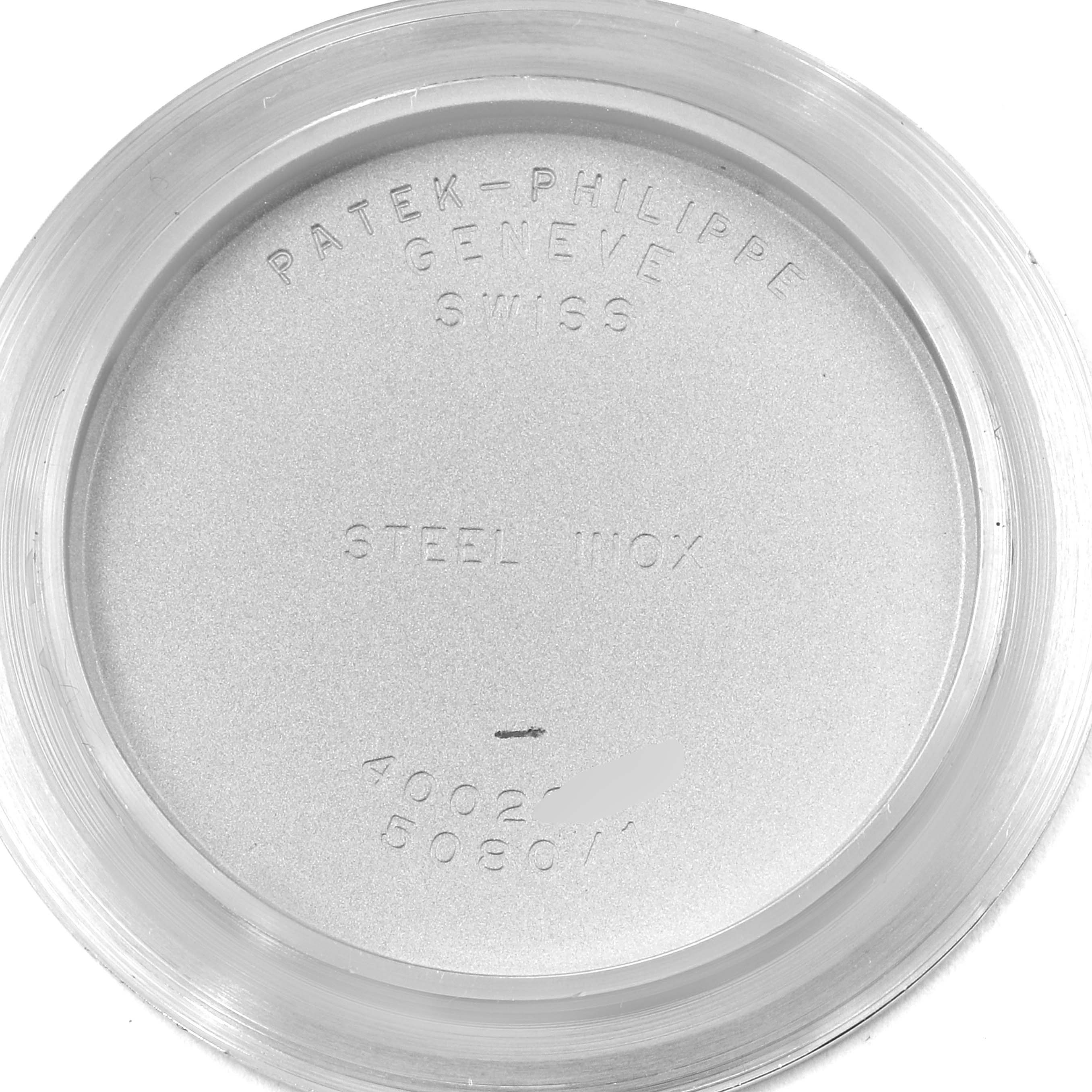 This image shows the inside part of the back cover of the Neptune model by Patek Philippe, displaying engravings.