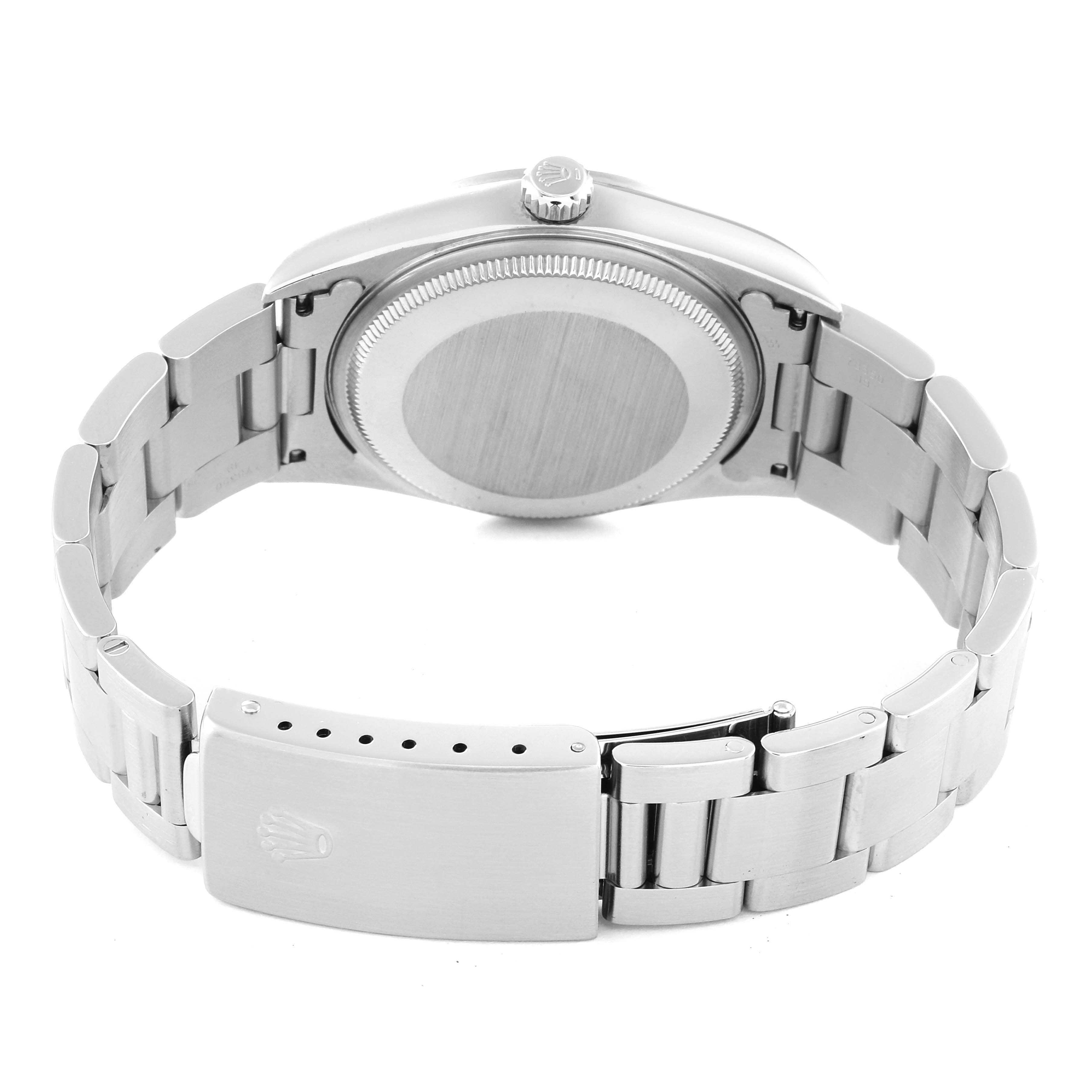 The image shows the back angle of the Rolex Air-King 14000 Men's Stainless Steel Blue Dial 14000 Men's Stainless Steel Blue Dial watch, displaying its case back, crown, and stainless steel bracelet with the clasp open.