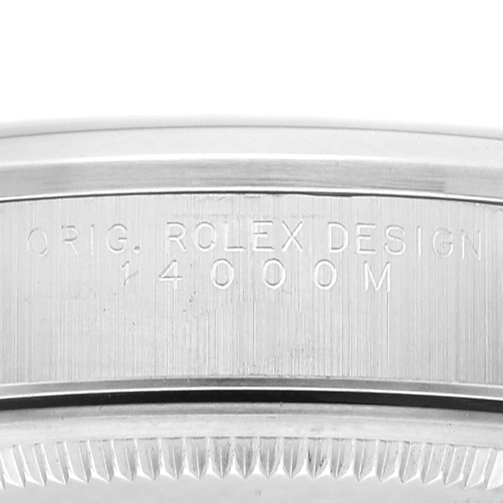 This image shows an angled close-up of the side of a Rolex Air-King 14000 Men's Stainless Steel Pink Dial 14000 Men's Stainless Steel Pink Dial watch case, highlighting the engraved model number.