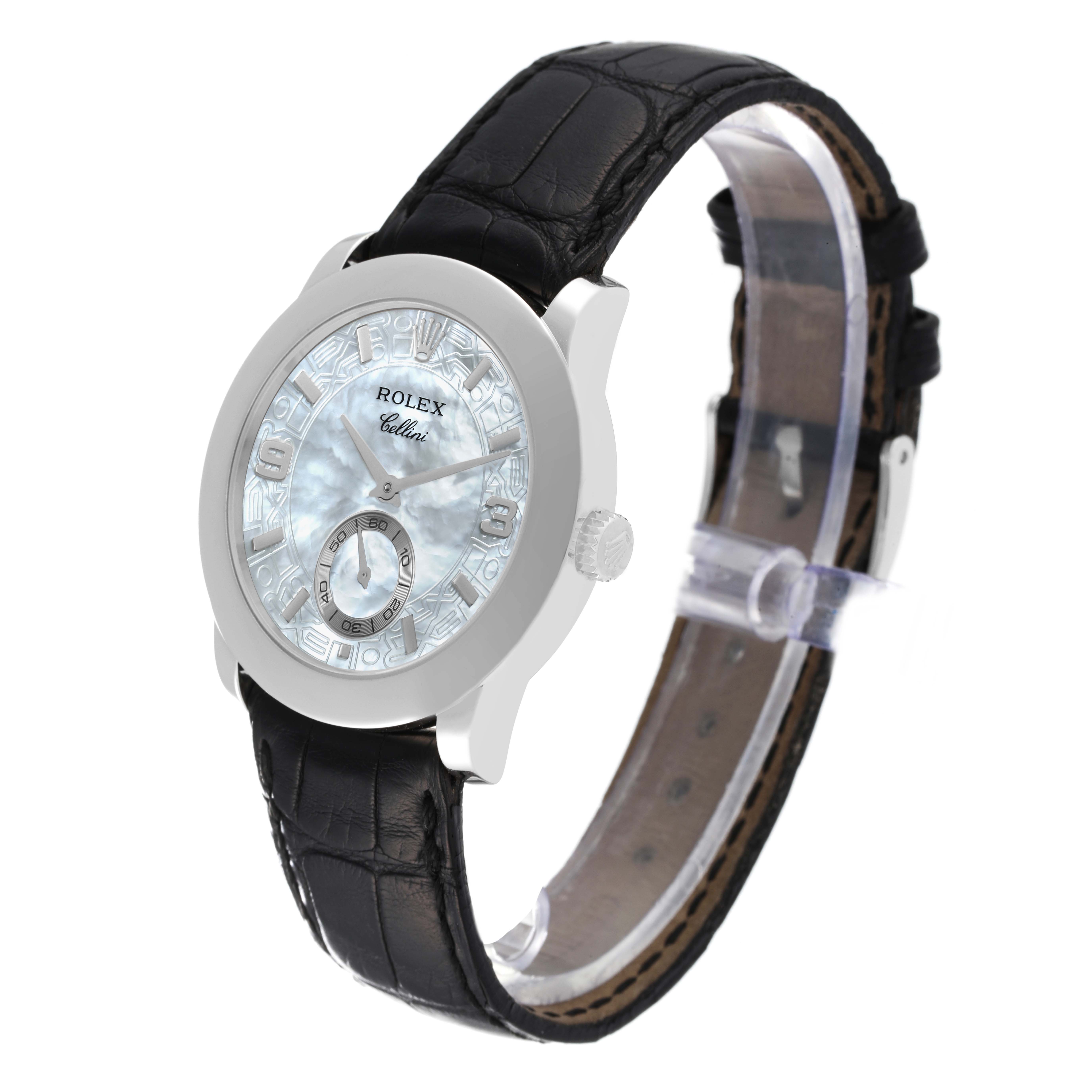 The Rolex Cellini 5240 Men's Platinum Mother of Pearl Dial 5240 Men's Platinum Mother of Pearl Dial watch is shown at a slight angle, displaying the face, hands, case, crown, and leather strap.