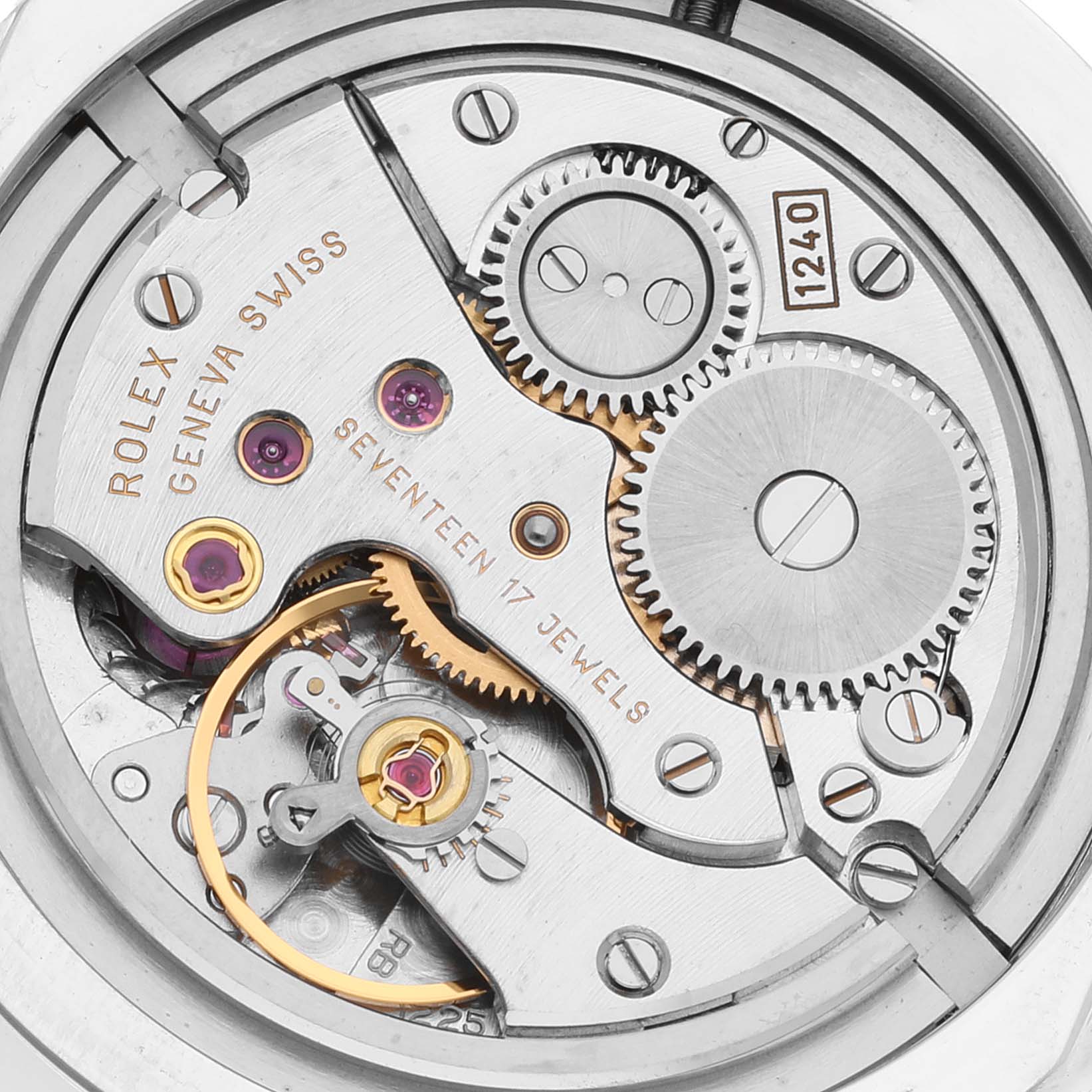 This image shows a close-up, top-down view of the internal mechanism of a Rolex Cellini 5240 Men's Platinum Mother of Pearl Dial 5240 Men's Platinum Mother of Pearl Dial watch, highlighting its gears and jewels.