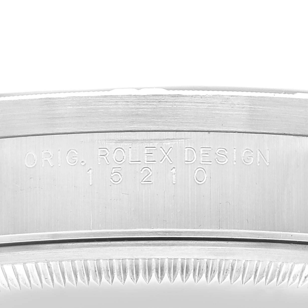 This close-up image shows the engraved bezel and case side of the Rolex Date 15210 Men's Stainless Steel Blue Dial 15210 Men's Stainless Steel Blue Dial model, highlighting its design and model number.