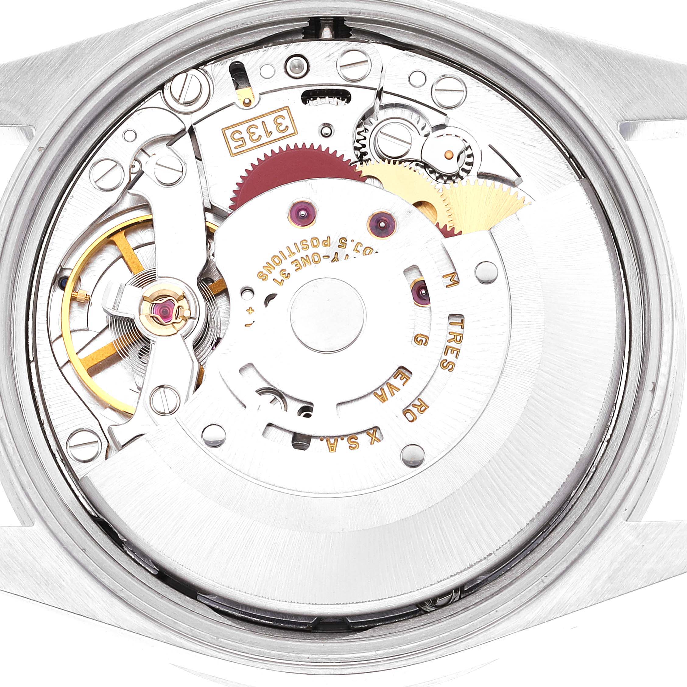 The image shows the back view of a Rolex Date 15210 Men's Stainless Steel Blue Dial 15210 Men's Stainless Steel Blue Dial model, displaying its intricate movement and gears.