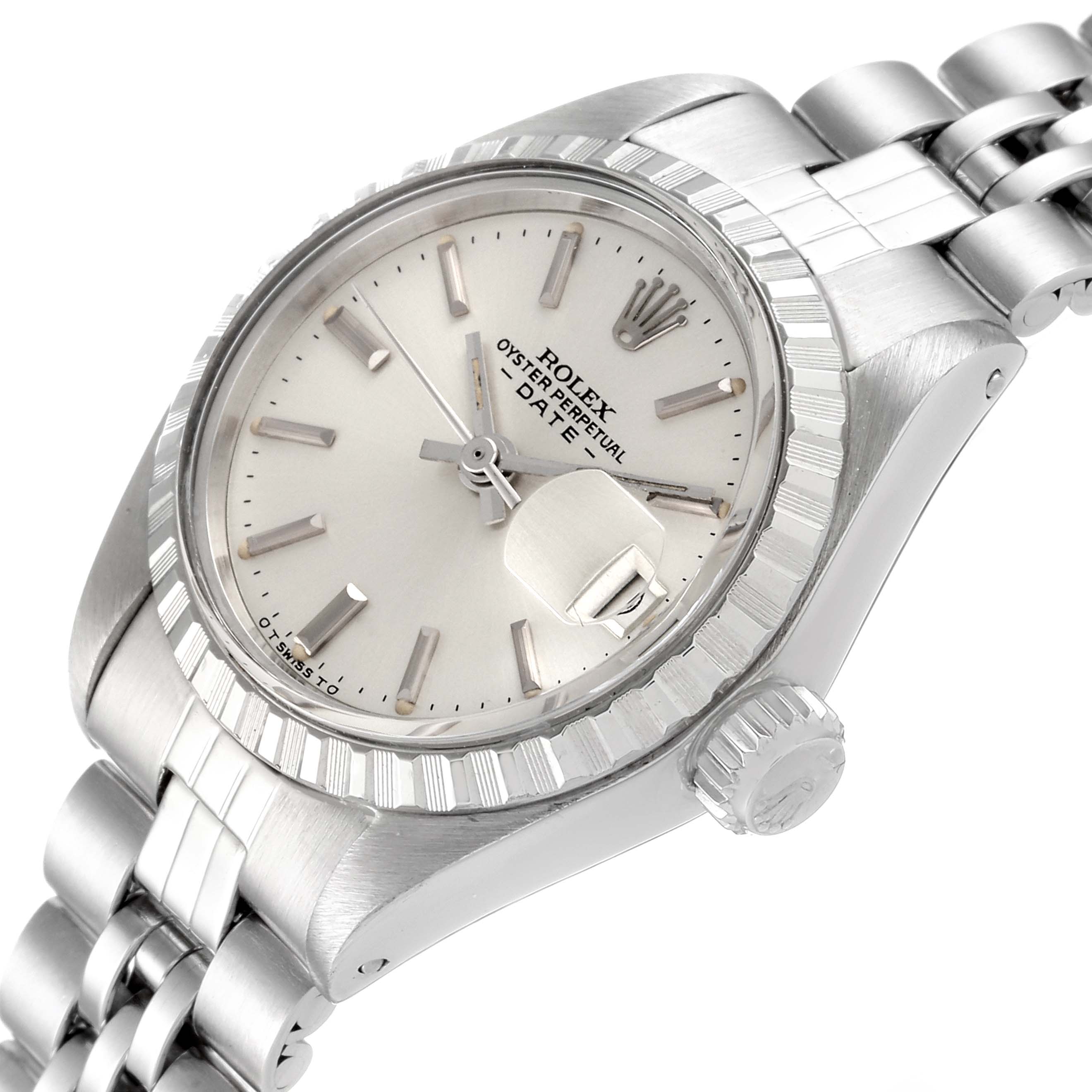 The image shows a close-up angled view of a Rolex Date 6924 Women
s Stainless Steel Silver Dial 6924 Women
s Stainless Steel Silver Dial watch, highlighting the dial, bezel, crown, and part of the bracelet.