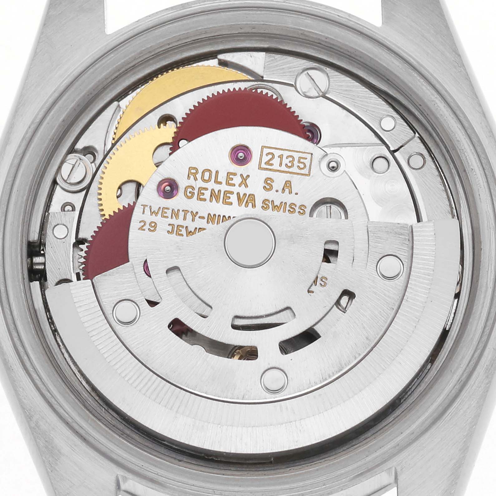 The image shows the movement of a Rolex Date 69160 Women
s Stainless Steel Silver Dial 69160 Women
s Stainless Steel Silver Dial model from a top-down angle, revealing gears and the rotor.