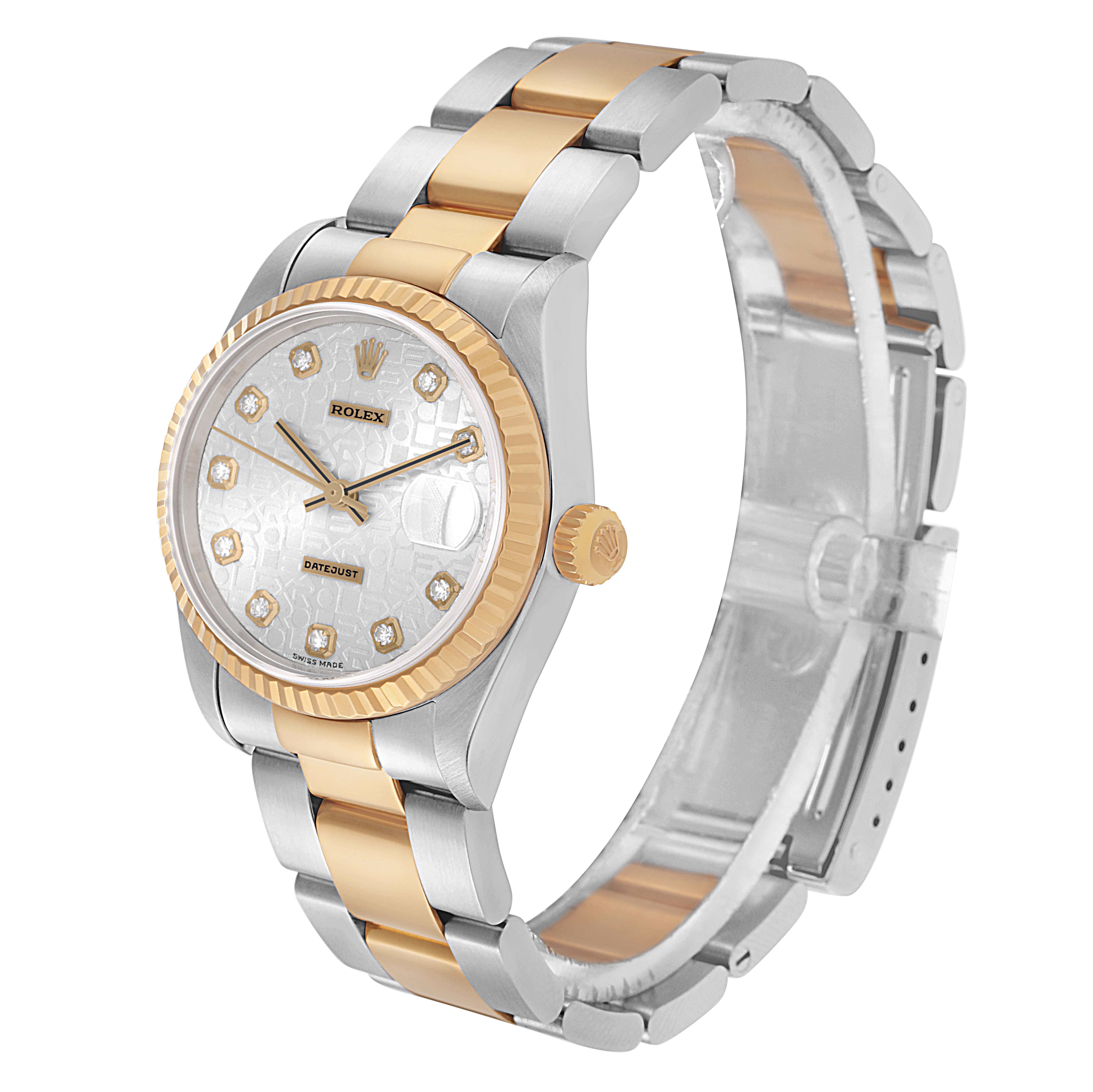The Rolex Mid-Size 178273 Women
s Steel and Gold (two tone) Silver Dial 178273 Women
s Steel and Gold (two tone) Silver Dial watch is shown at a three-quarter angle, highlighting its two-tone bracelet, bezel, and dial.