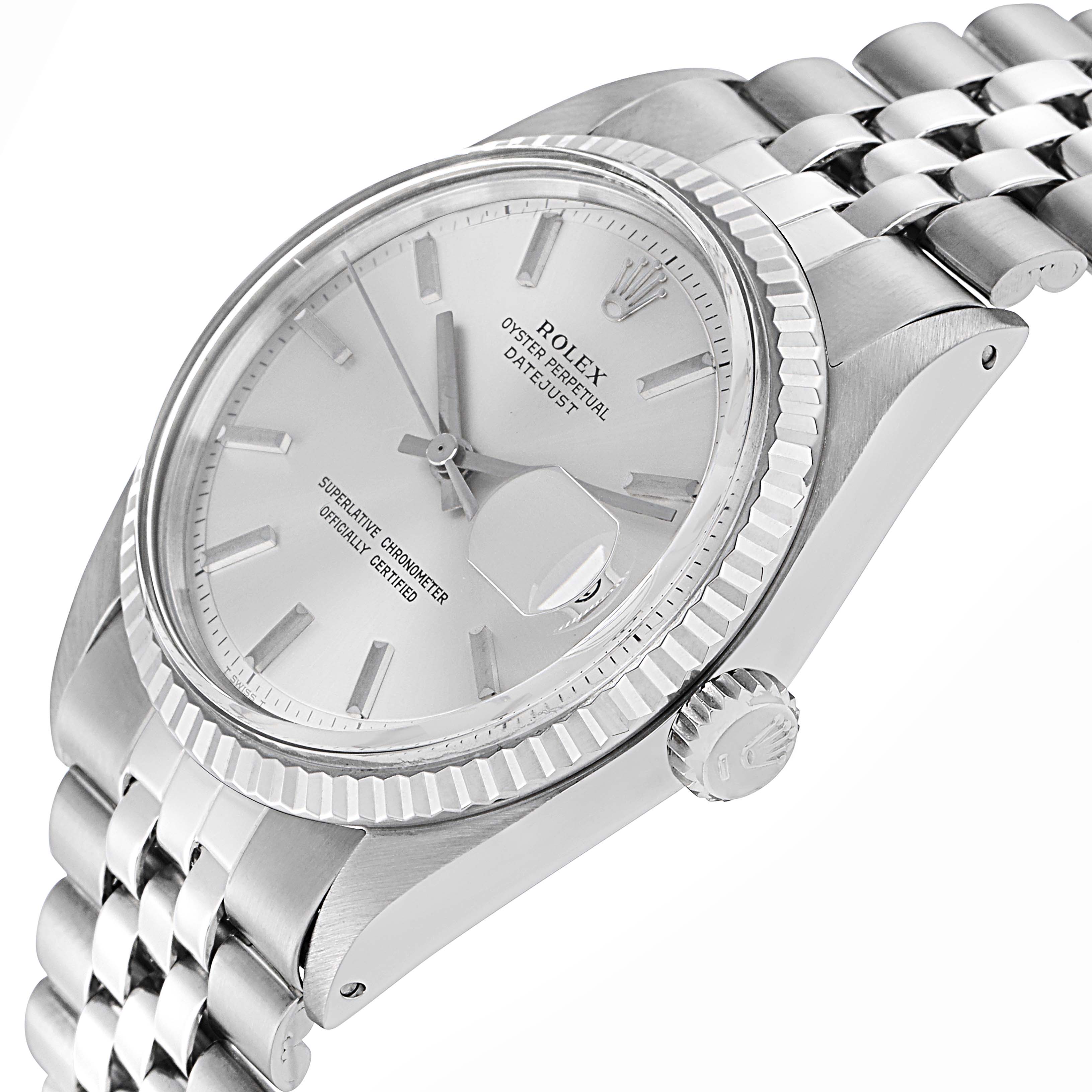 The Rolex Datejust 1601 Men
s Stainless Steel Silver Dial 1601 Men
s Stainless Steel Silver Dial watch is shown at an angle highlighting the dial, fluted bezel, crown, and part of the Jubilee bracelet.