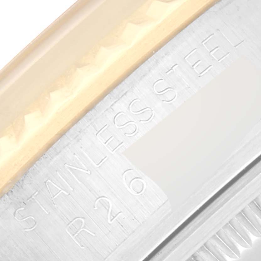 Close-up showing the side engraving and bezel of a Rolex Datejust 16013 Men's Steel and Gold (two tone) Black Dial 16013 Men's Steel and Gold (two tone) Black Dial watch.