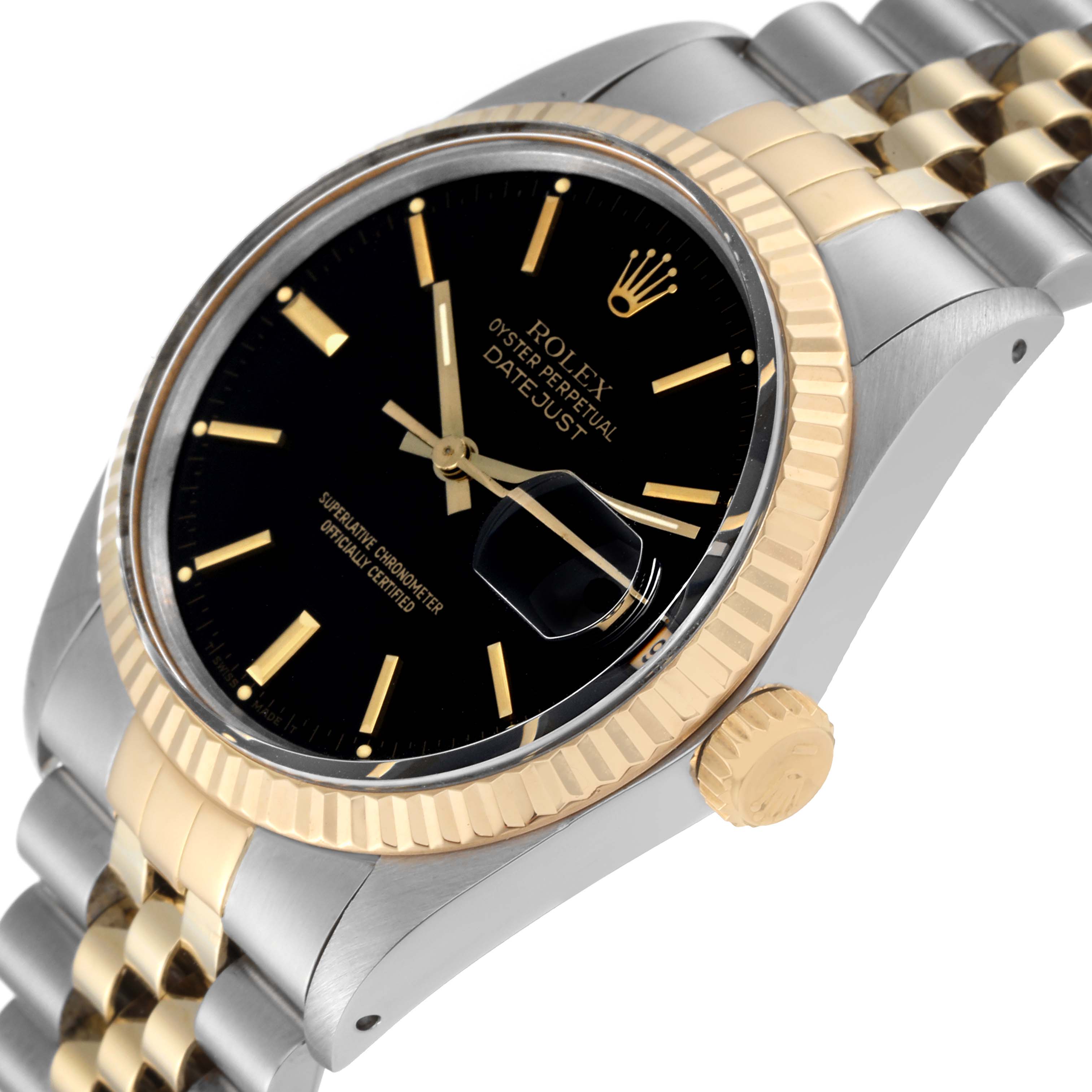 The image shows the dial, crown, and part of the bracelet of a Rolex Datejust 16013 Men's Steel and Gold (two tone) Black Dial 16013 Men's Steel and Gold (two tone) Black Dial watch, viewed from a slight angle.