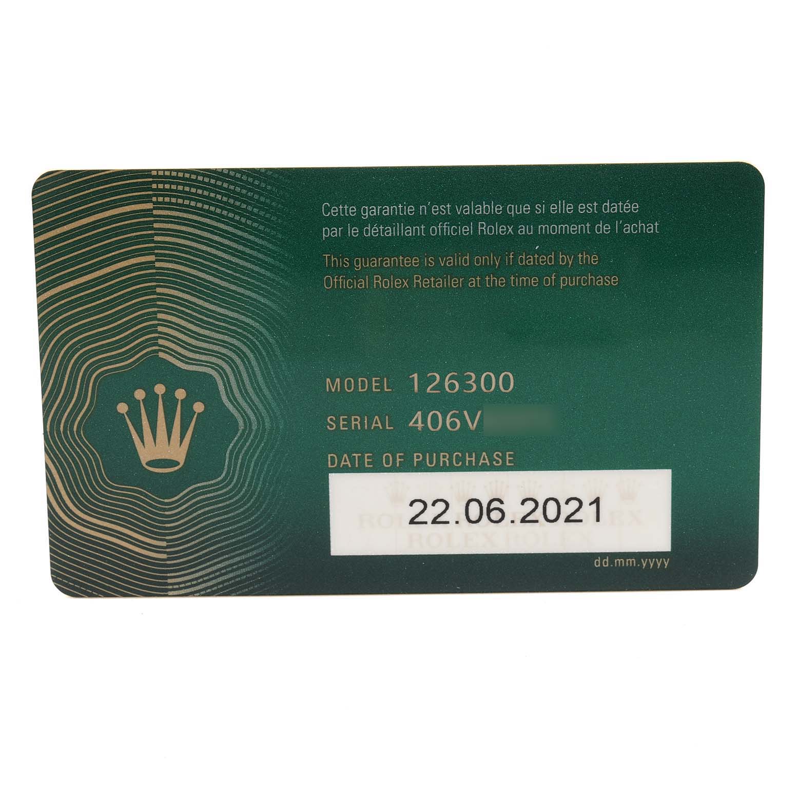 The image shows a Rolex Datejust 41 126300 Men
s Stainless Steel Blue Dial 126300 Men
s Stainless Steel Blue Dial model warranty card displaying the model and serial number along with the date of purchase.