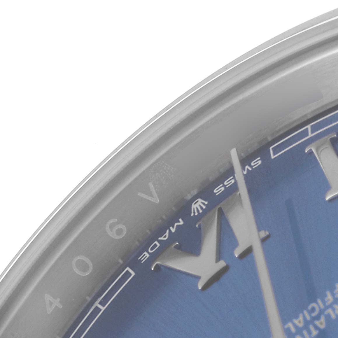This image shows a close-up of the dial, crystal, and part of the bezel of a Rolex Datejust 41 126300 Men
s Stainless Steel Blue Dial 126300 Men
s Stainless Steel Blue Dial watch.