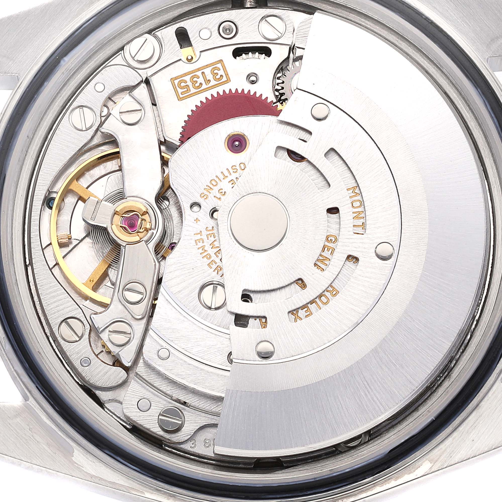 This image shows the exposed movement and internal parts of a Rolex Datejust 16200 Men's Stainless Steel Blue Dial 16200 Men's Stainless Steel Blue Dial watch from a top-down angle.