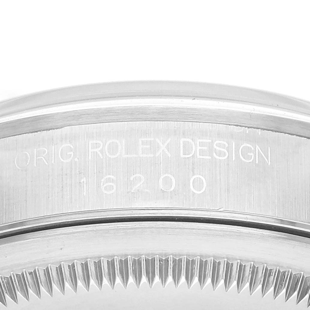 The image shows the side angle of a Rolex Datejust 16200 Men's Stainless Steel Blue Dial 16200 Men's Stainless Steel Blue Dial watch case, highlighting the engraved model number 16200.