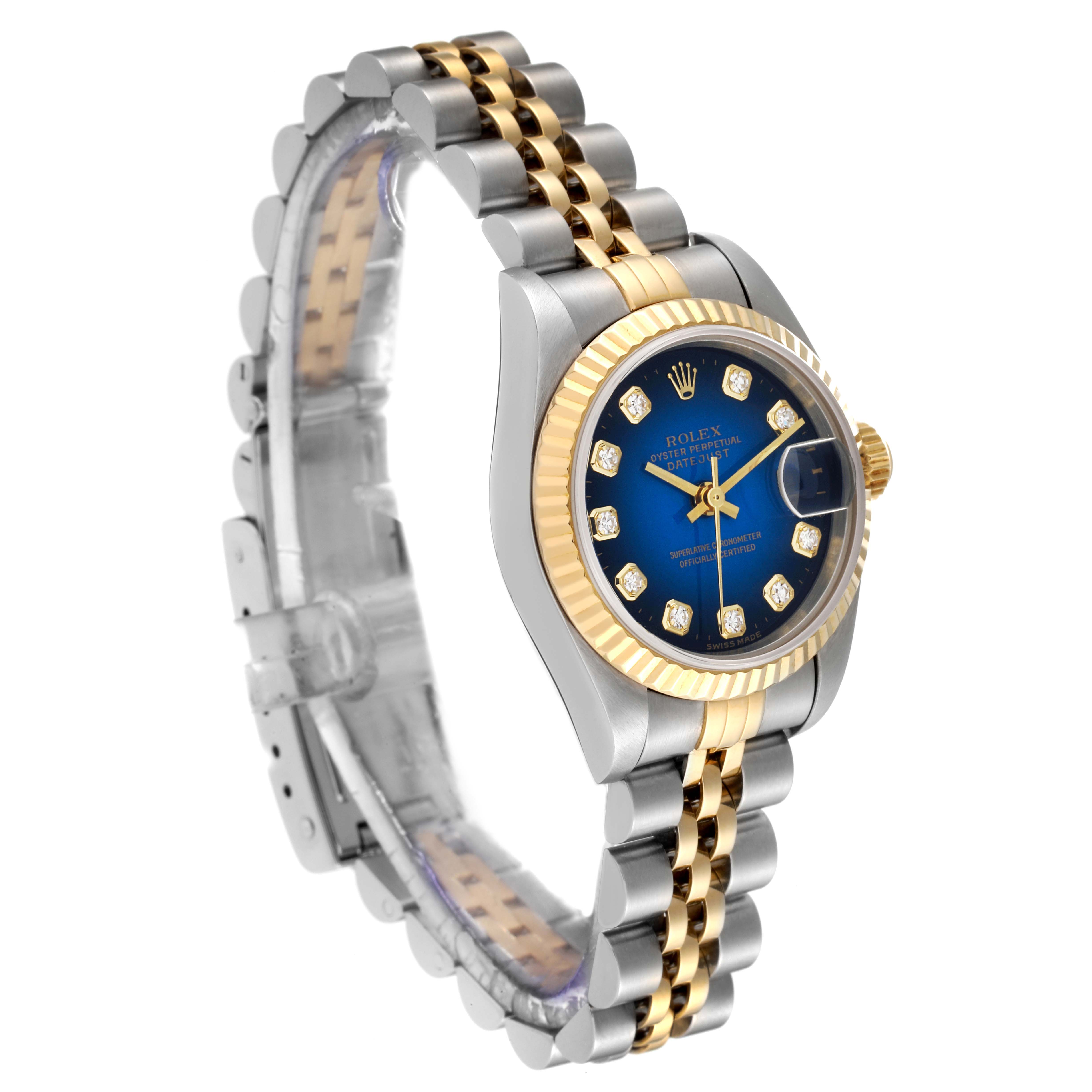 The Rolex Datejust 69173 Women's Steel and Gold (two tone) Blue Dial 69173 Women's Steel and Gold (two tone) Blue Dial watch is shown at a three-quarter angle, highlighting its two-tone bracelet, blue dial, and fluted bezel.
