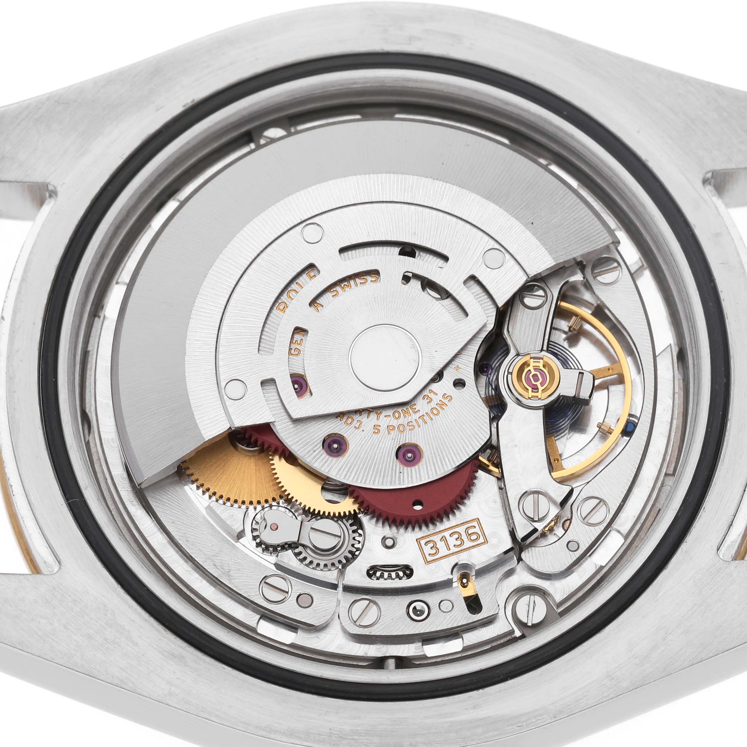 The image shows the movement of the Rolex Datejust 41 116333 Men's Steel and Gold (two tone) Black Dial from a top-down angle, highlighting gears and mechanical components.
