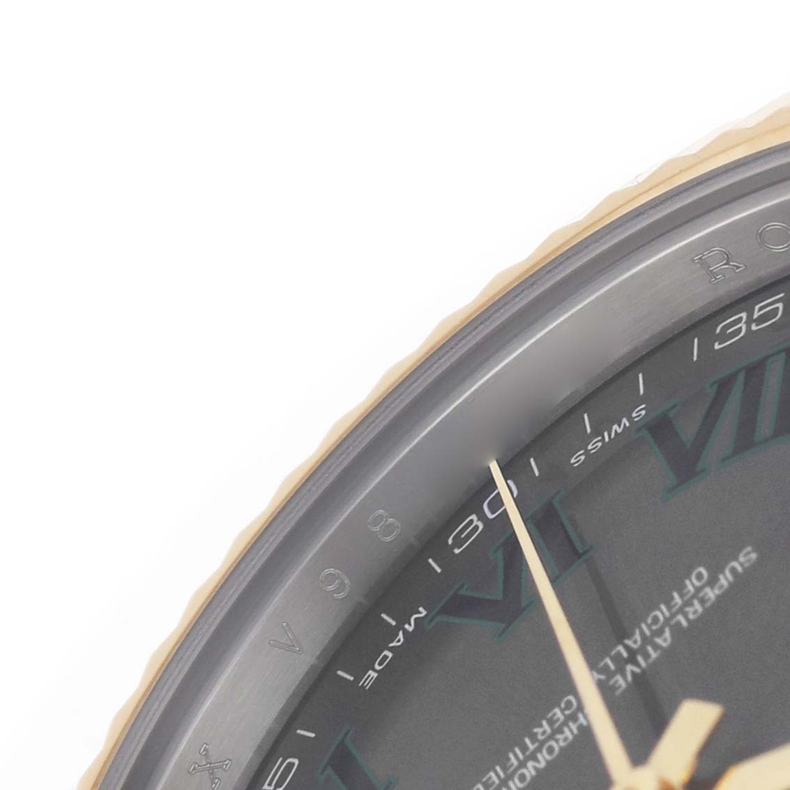 The image shows a partial view of the Rolex Datejust 41 116333 Men's Steel and Gold (two tone) Black Dial watch face, focusing on the bezel, Roman numerals, and second hand.