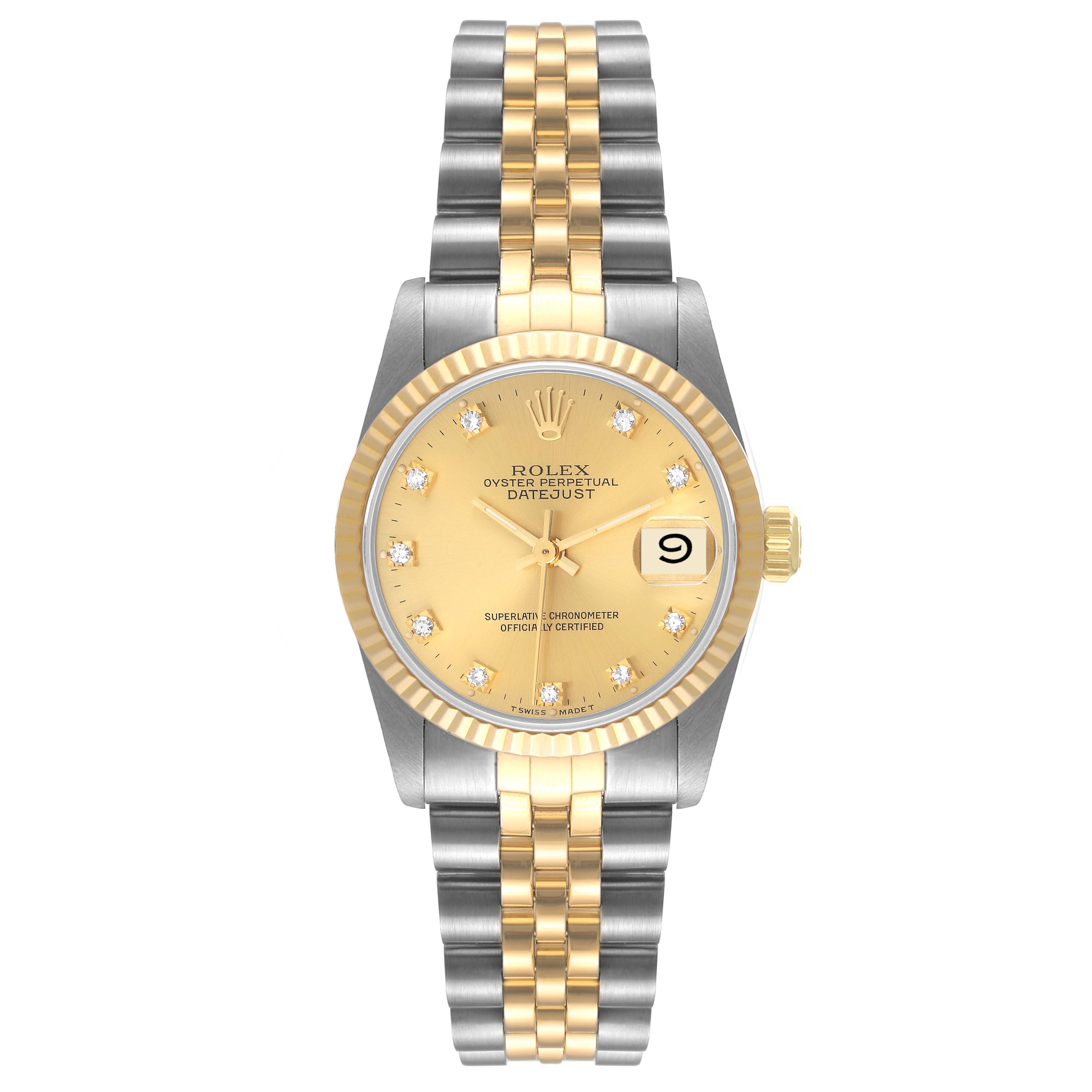 The image shows a front view of a Rolex Datejust 68273 Women
s Steel and Gold (two tone) Champagne Dial 68273 Women
s Steel and Gold (two tone) Champagne Dial watch with a two-tone bracelet and a gold dial with diamond markers.