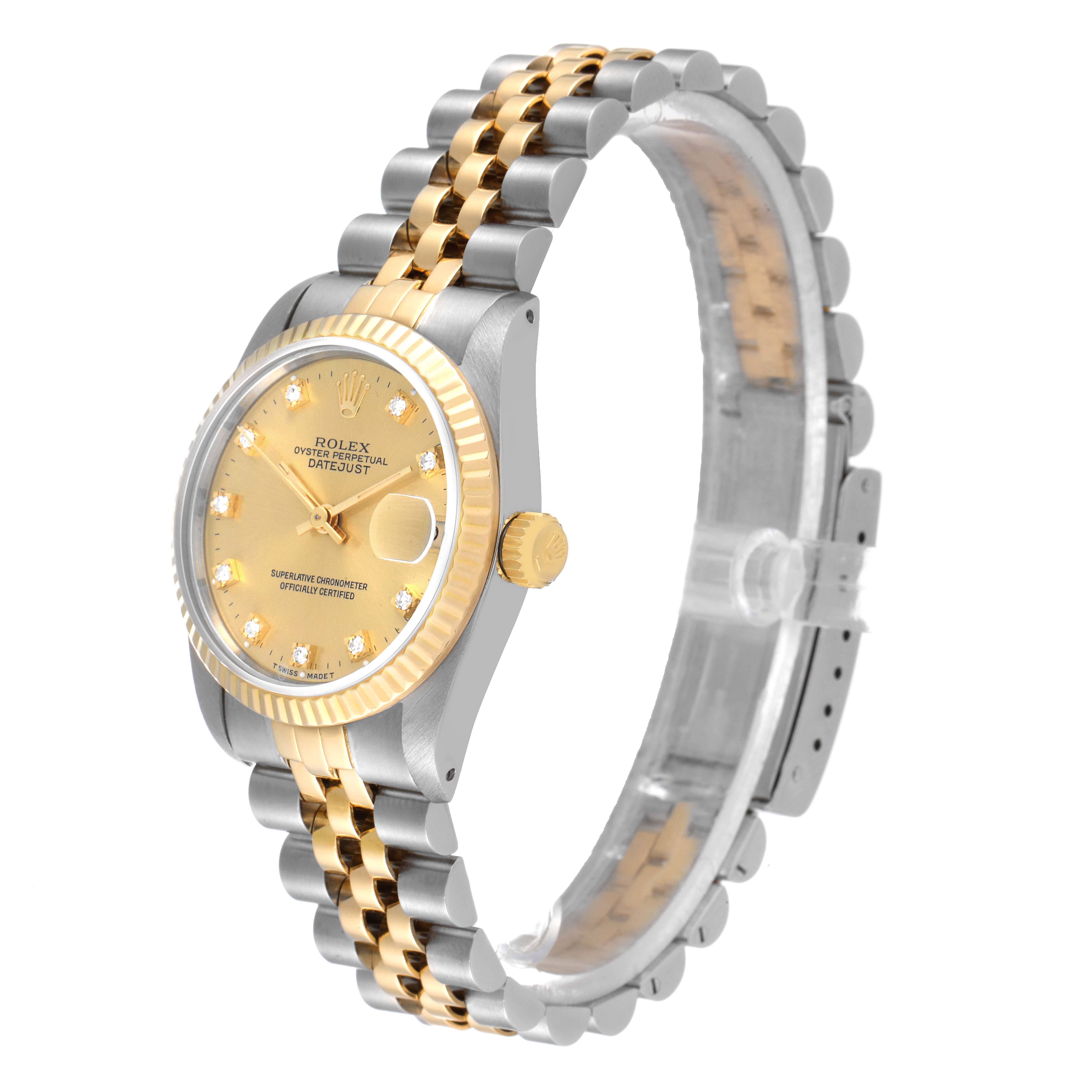 The image shows a Rolex Datejust 68273 Women
s Steel and Gold (two tone) Champagne Dial 68273 Women
s Steel and Gold (two tone) Champagne Dial watch at a side angle, highlighting its two-tone bracelet, fluted bezel, and champagne dial.