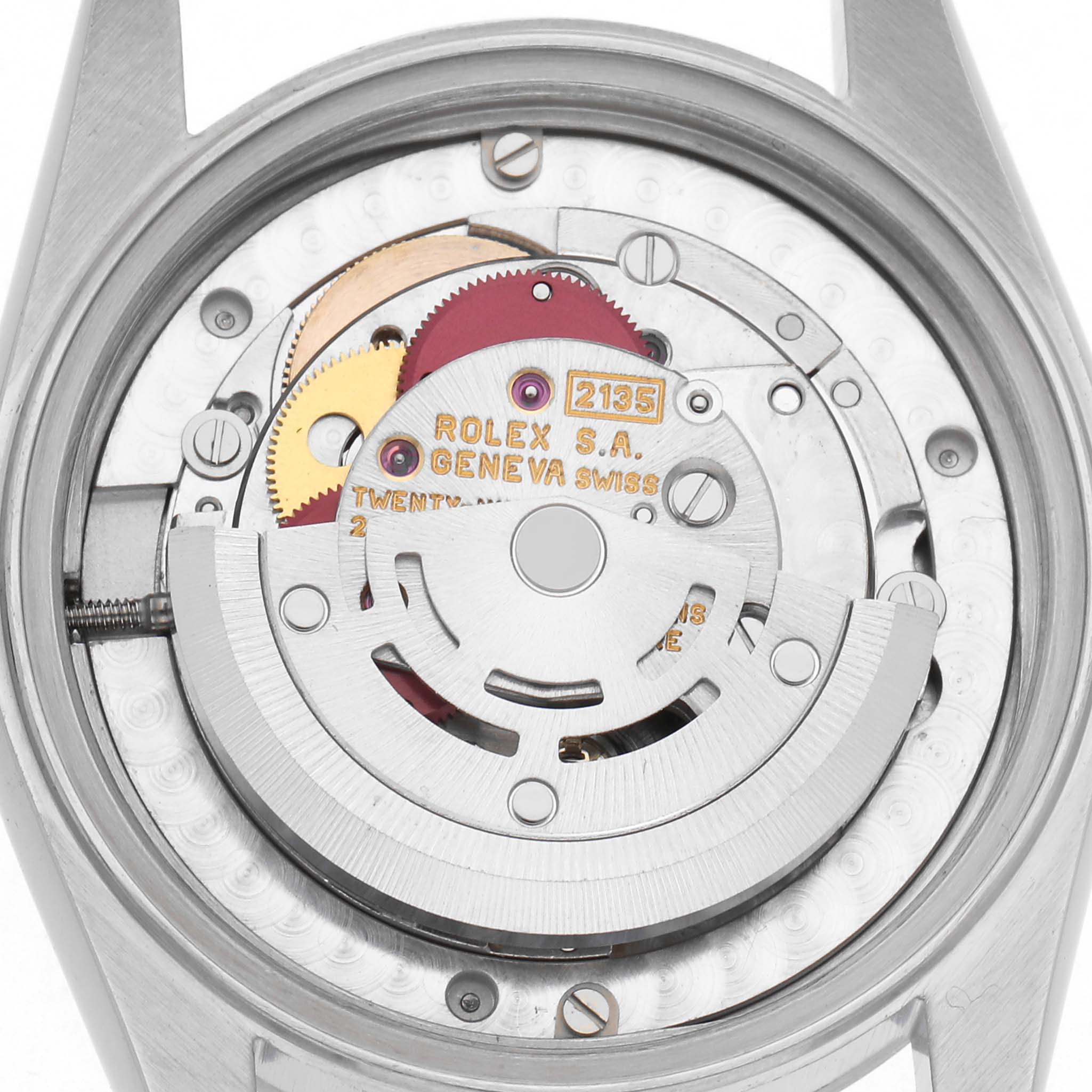 The image shows the back view of a Rolex Mid-Size 68274 Women
s Stainless Steel White Dial 68274 Women
s Stainless Steel White Dial watch, highlighting the movement and rotor.