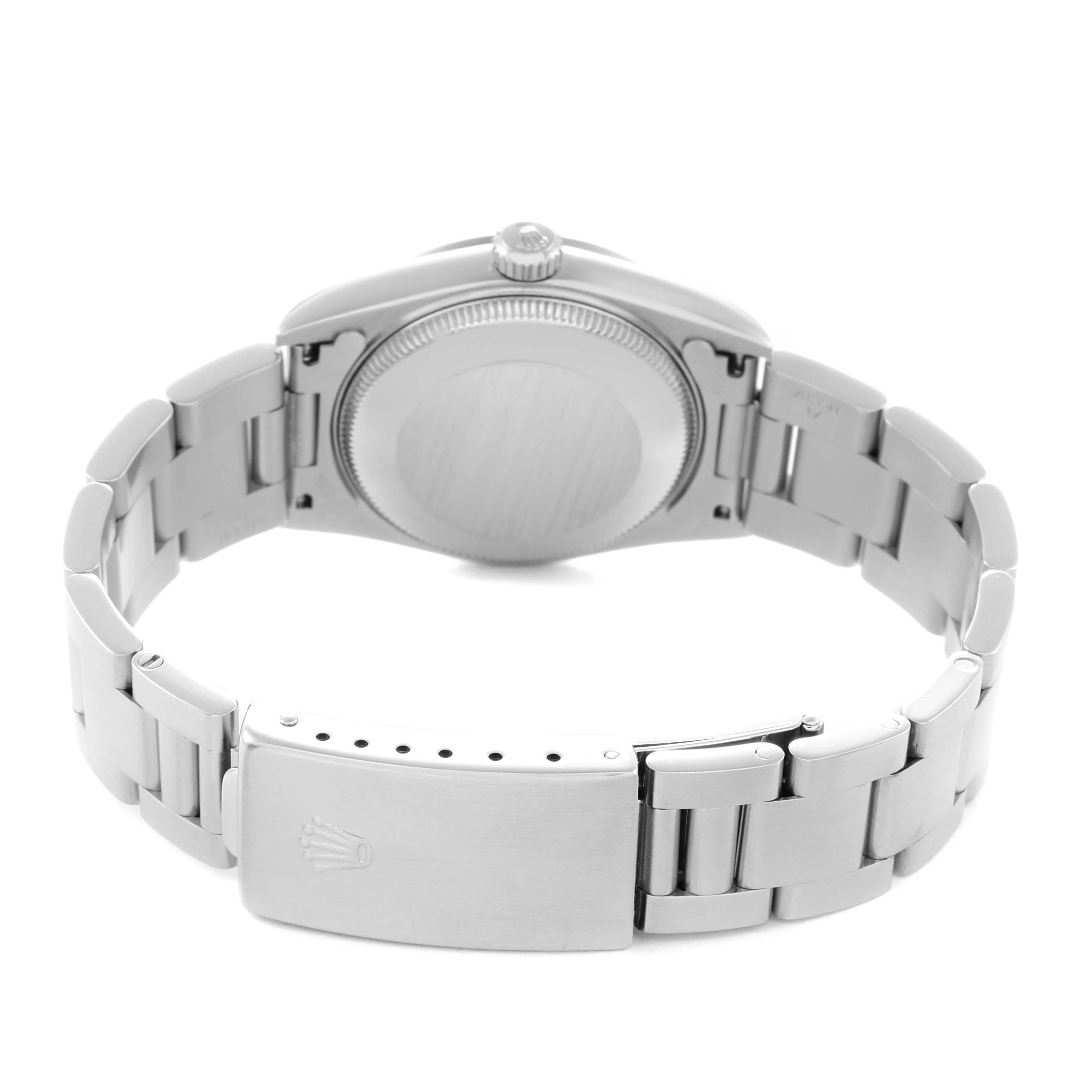 The image shows the back view of a Rolex Mid-Size 68274 Women
s Stainless Steel White Dial 68274 Women
s Stainless Steel White Dial watch, highlighting the case back and bracelet clasp.