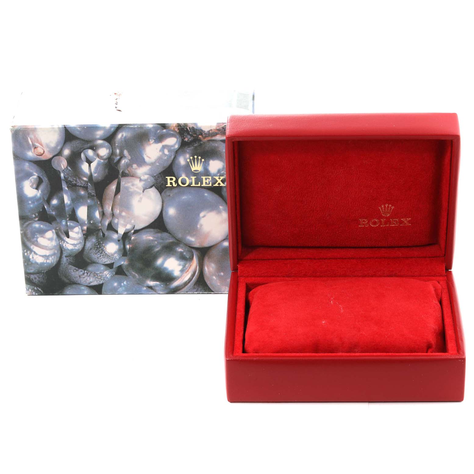 The image shows the box and cushion for a President model by Rolex.