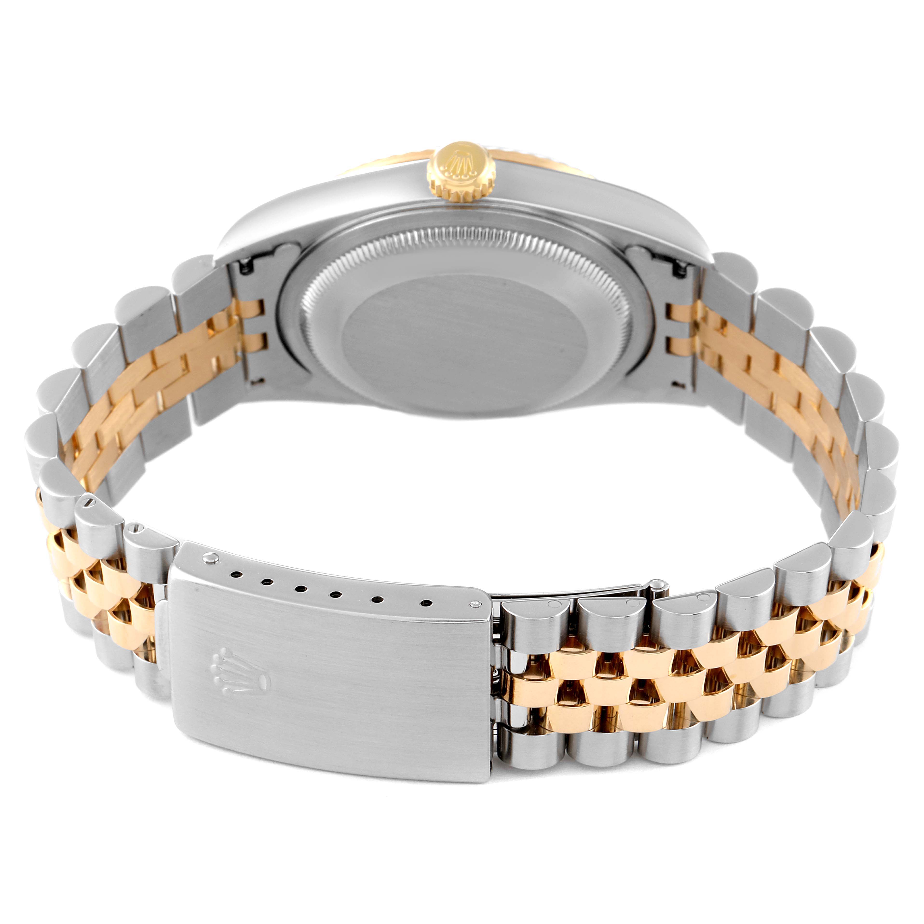 The image shows the back view of a Rolex Datejust 16233 Men's Steel and Gold (two tone) White Dial 16233 Men's Steel and Gold (two tone) White Dial watch, highlighting the case, crown, and two-tone Jubilee bracelet.