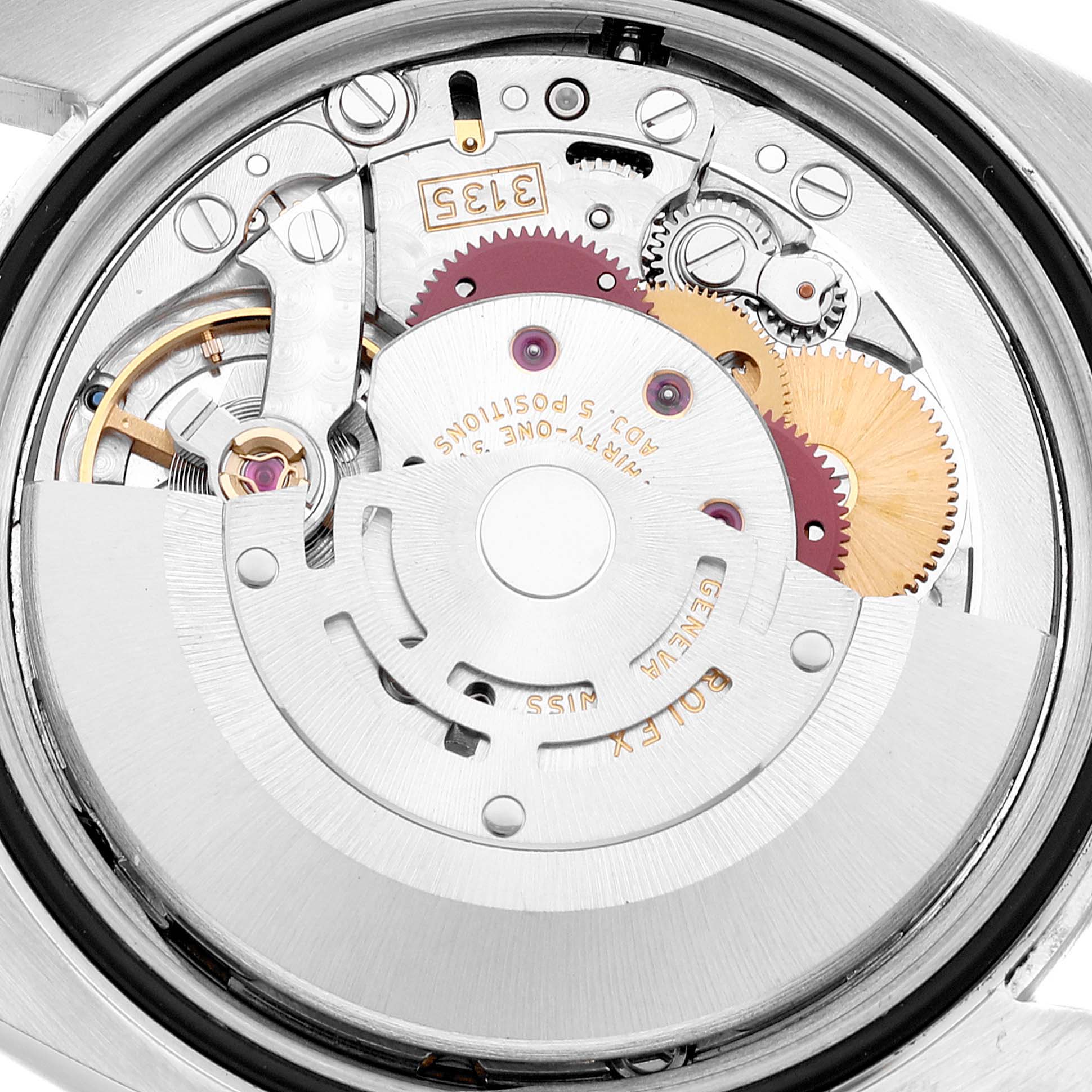 This is a close-up view of the internal movement mechanism of a Rolex Datejust 116234 Men's Stainless Steel Black Dial 116234 Men's Stainless Steel Black Dial watch.