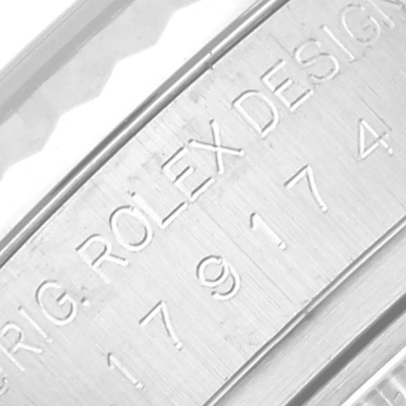 The image shows a close-up of the engraved model number on the case of a Rolex Datejust 179174 Women's Stainless Steel Black Dial 179174 Women's Stainless Steel Black Dial.