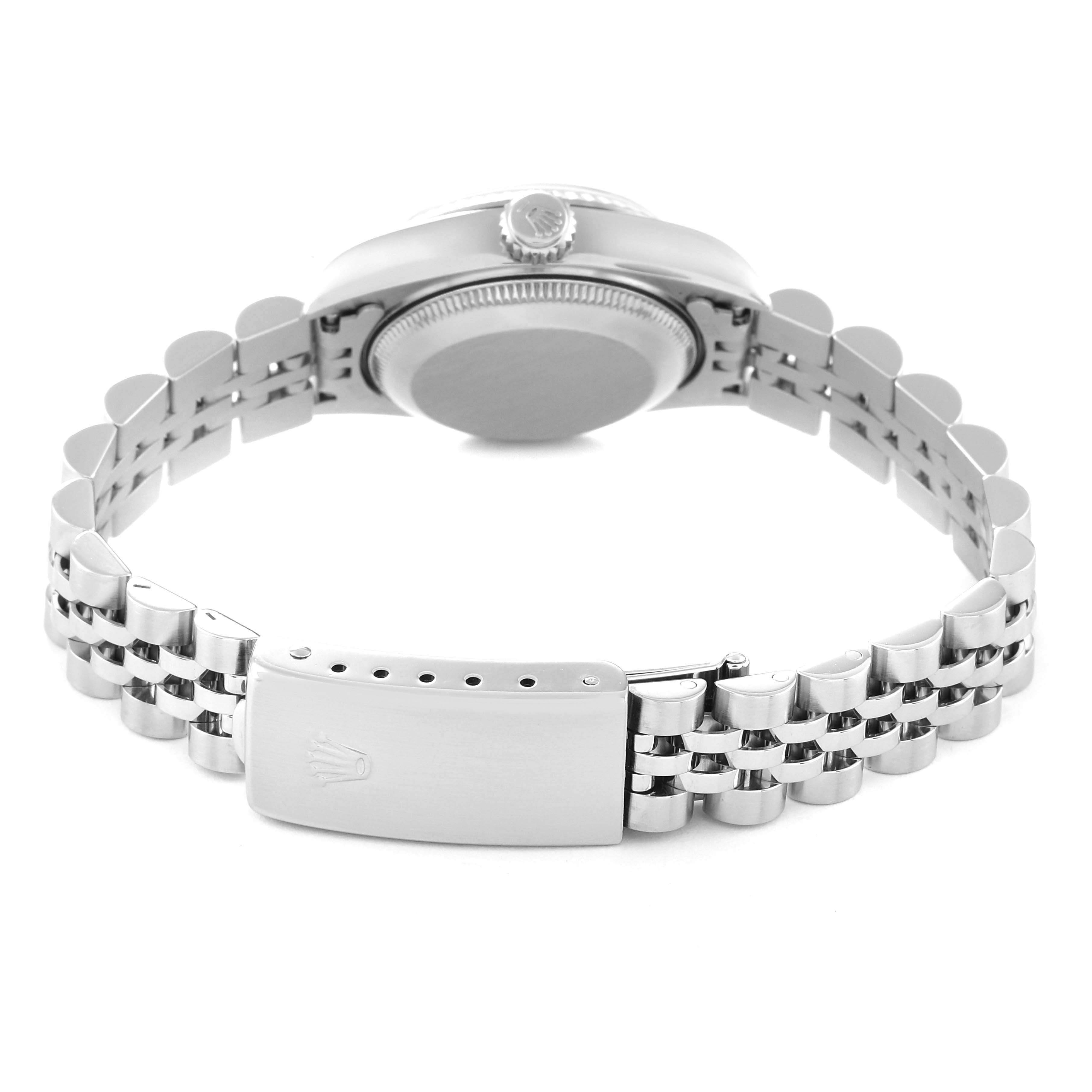 The image shows the back view of a Rolex Datejust 69174 Women's Stainless Steel Blue Dial 69174 Women's Stainless Steel Blue Dial watch displaying the case back, crown, and the bracelet with the clasp visible.