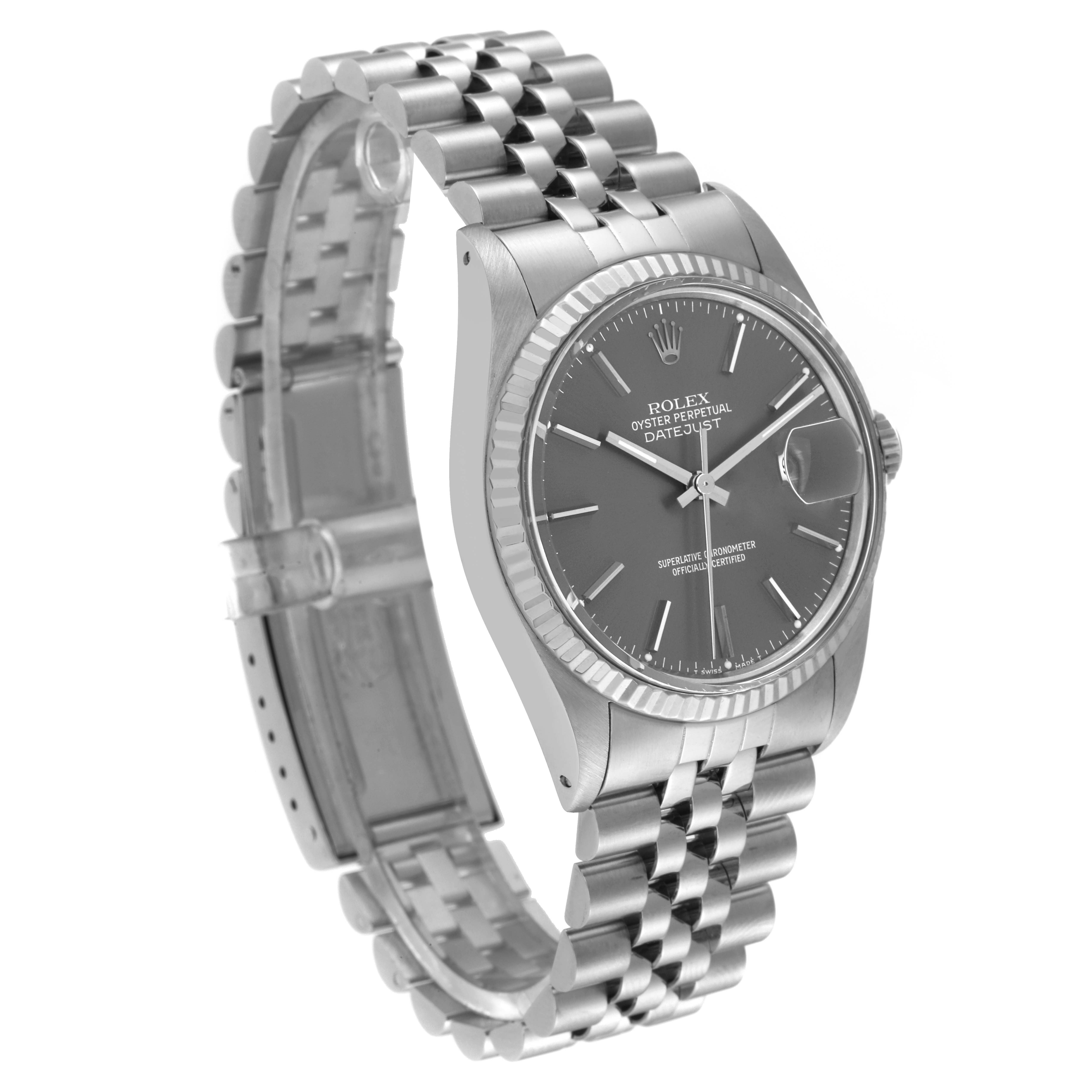 The Rolex Datejust 16014 Men's Stainless Steel Grey Dial 16014 Men's Stainless Steel Grey Dial watch is shown at a slight angle displaying its face, bezel, crown, and bracelet.