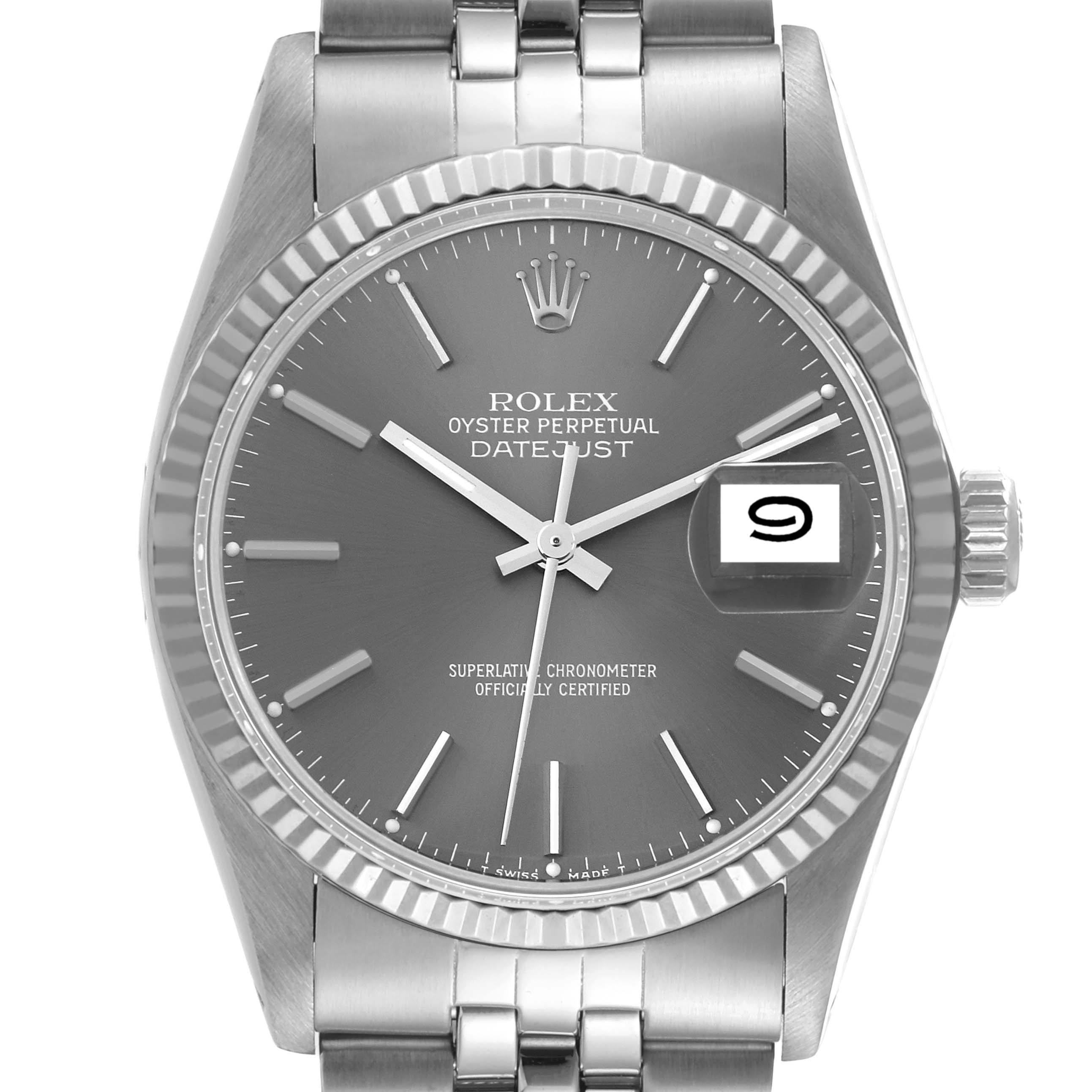 The image shows a front view of the Rolex Datejust 16014 Men's Stainless Steel Grey Dial 16014 Men's Stainless Steel Grey Dial watch, highlighting the dial, hands, date window, and fluted bezel.
