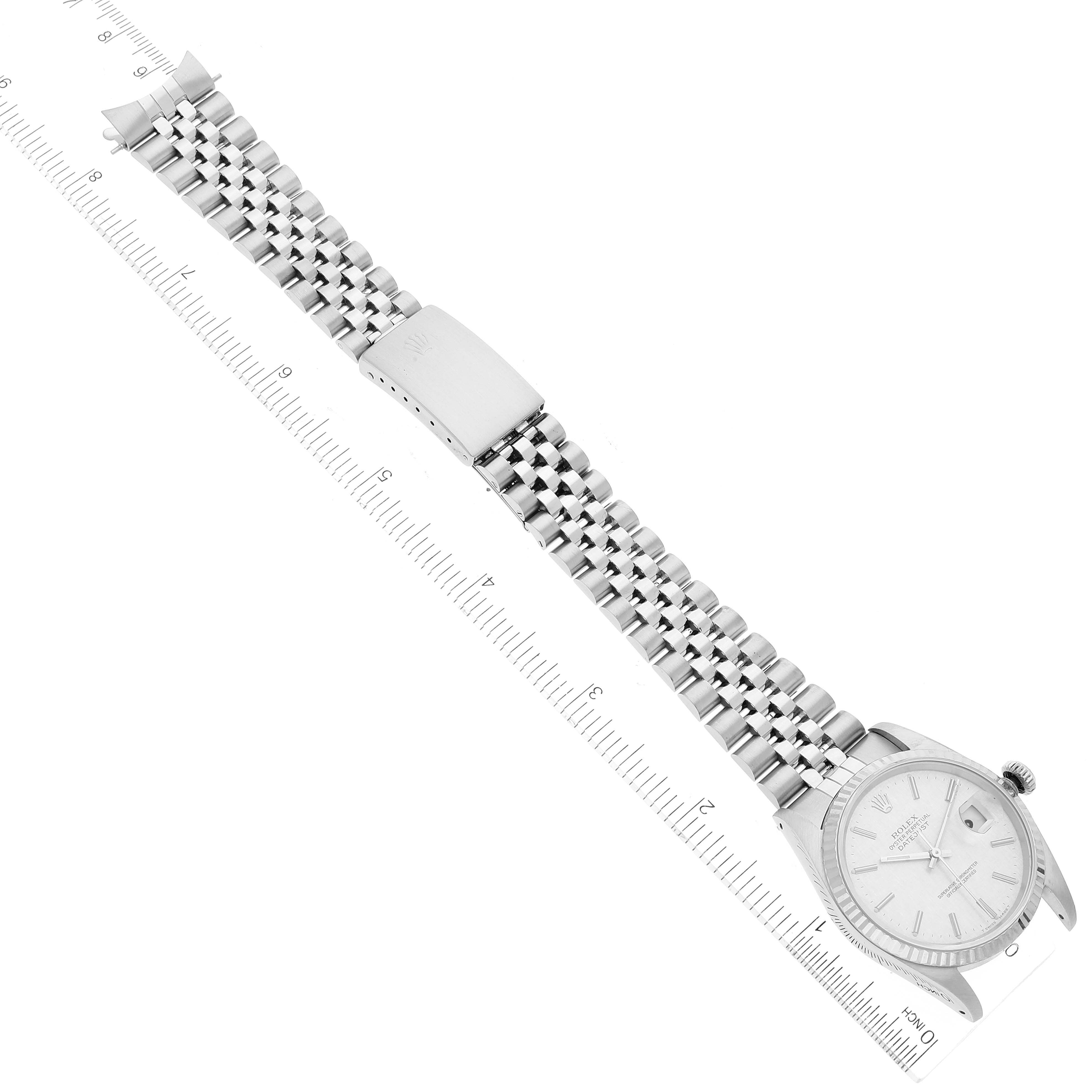 The image shows a top-down view of a Rolex Datejust 16234 Men's Stainless Steel Silver Dial 16234 Men's Stainless Steel Silver Dial watch, including the full bracelet and face.