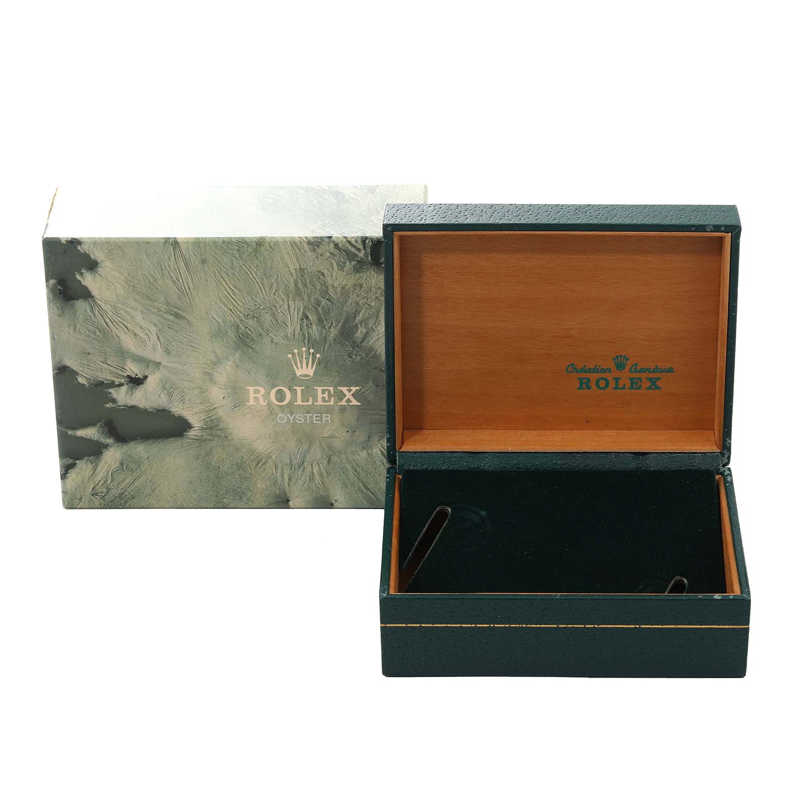 The image shows an open green and wooden Rolex box and its outer packaging for the Vintage Collection model.