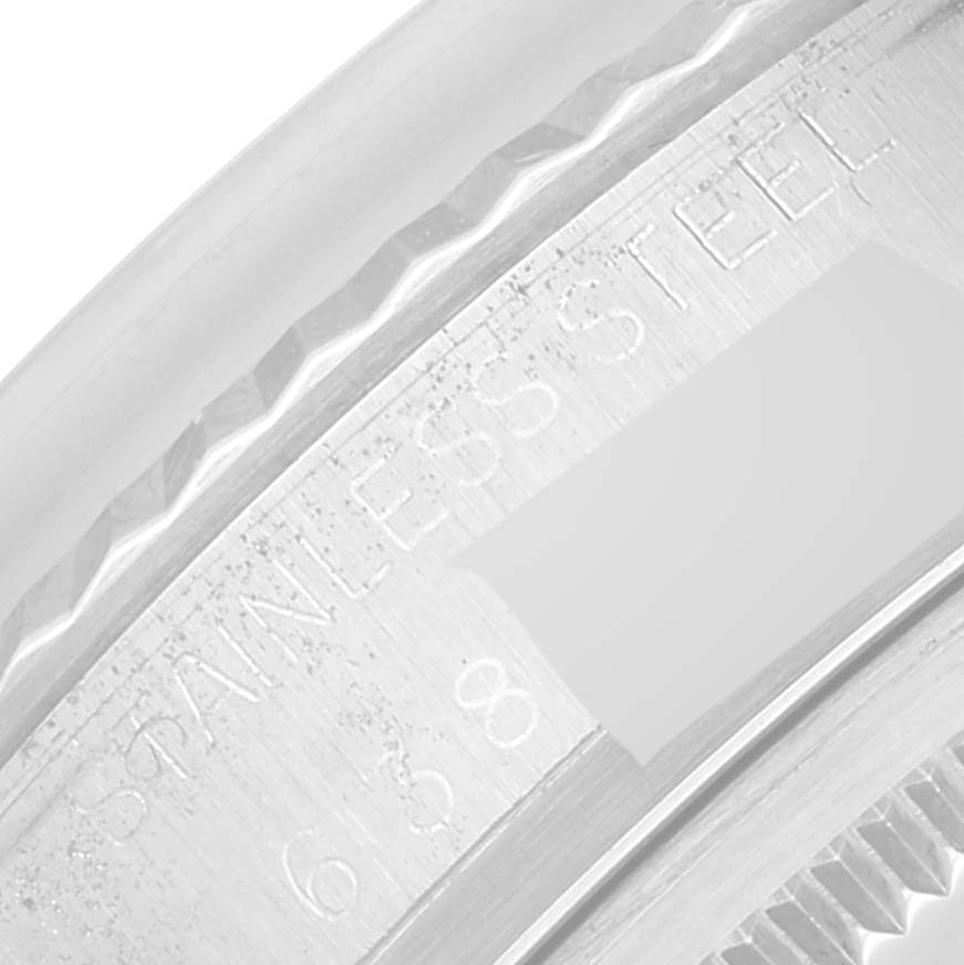 This image shows a close-up of the side engraving on a stainless steel Rolex Vintage Collection 16014 Men's Stainless Steel Silver Dial 16014 Men's Stainless Steel Silver Dial watch.