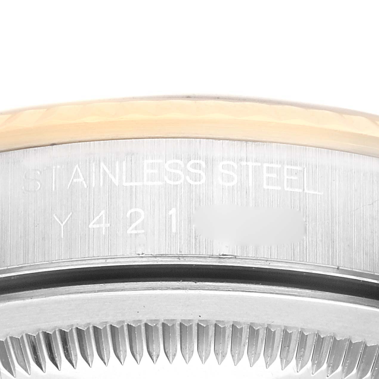 The image shows a close-up of the side engraving and bezel of a Rolex Datejust 16233 Men's Steel and Gold (two tone) Black Dial 16233 Men's Steel and Gold (two tone) Black Dial watch.