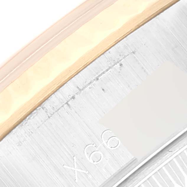 The image shows a close-up of the case and part of the bezel of a Rolex Datejust 69173 Women's Steel and Gold (two tone) Champagne Dial 69173 Women's Steel and Gold (two tone) Champagne Dial watch.