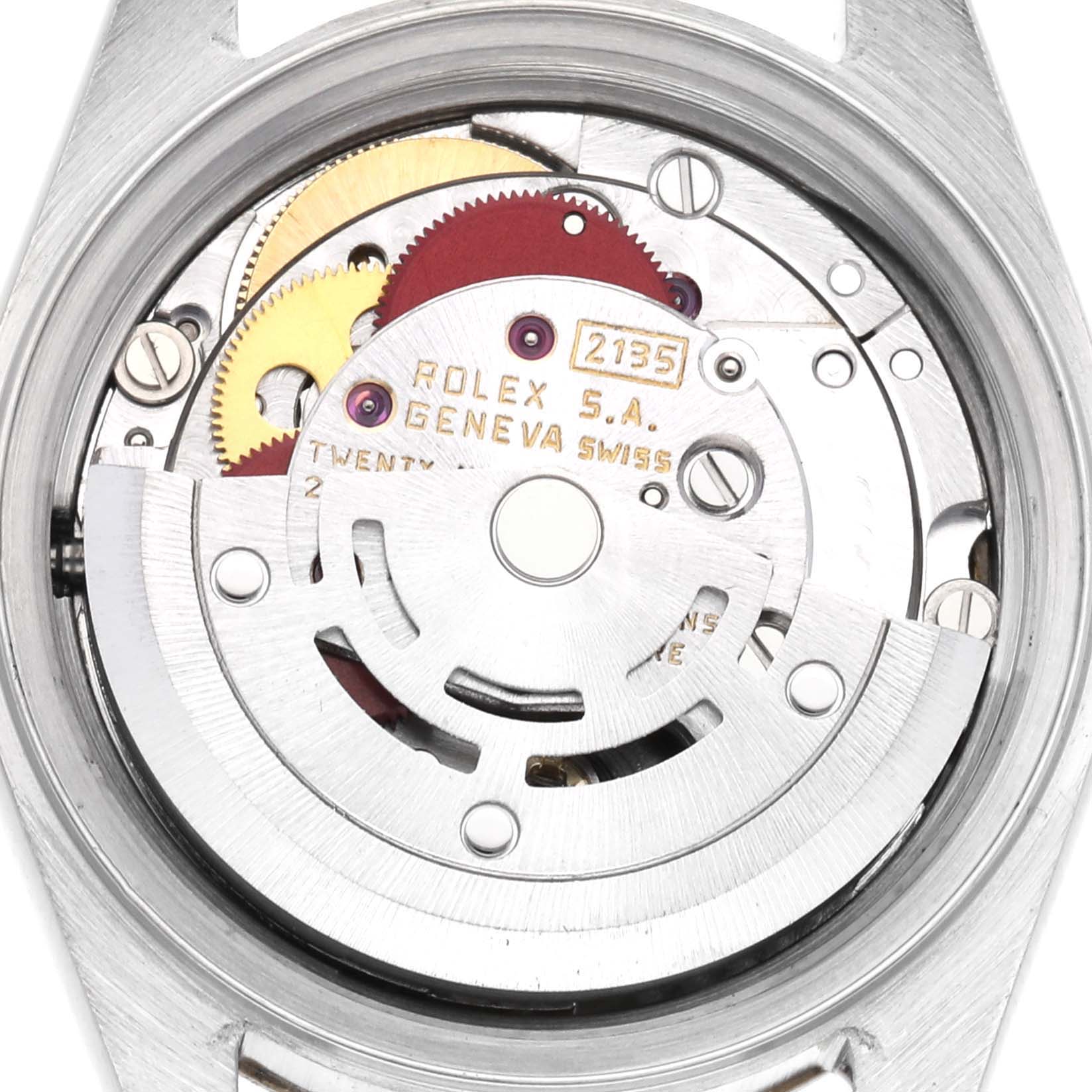 The image shows the movement mechanism of a Rolex Datejust 69173 Women's Steel and Gold (two tone) Champagne Dial 69173 Women's Steel and Gold (two tone) Champagne Dial watch from a top-down angle, revealing gears and inscriptions.