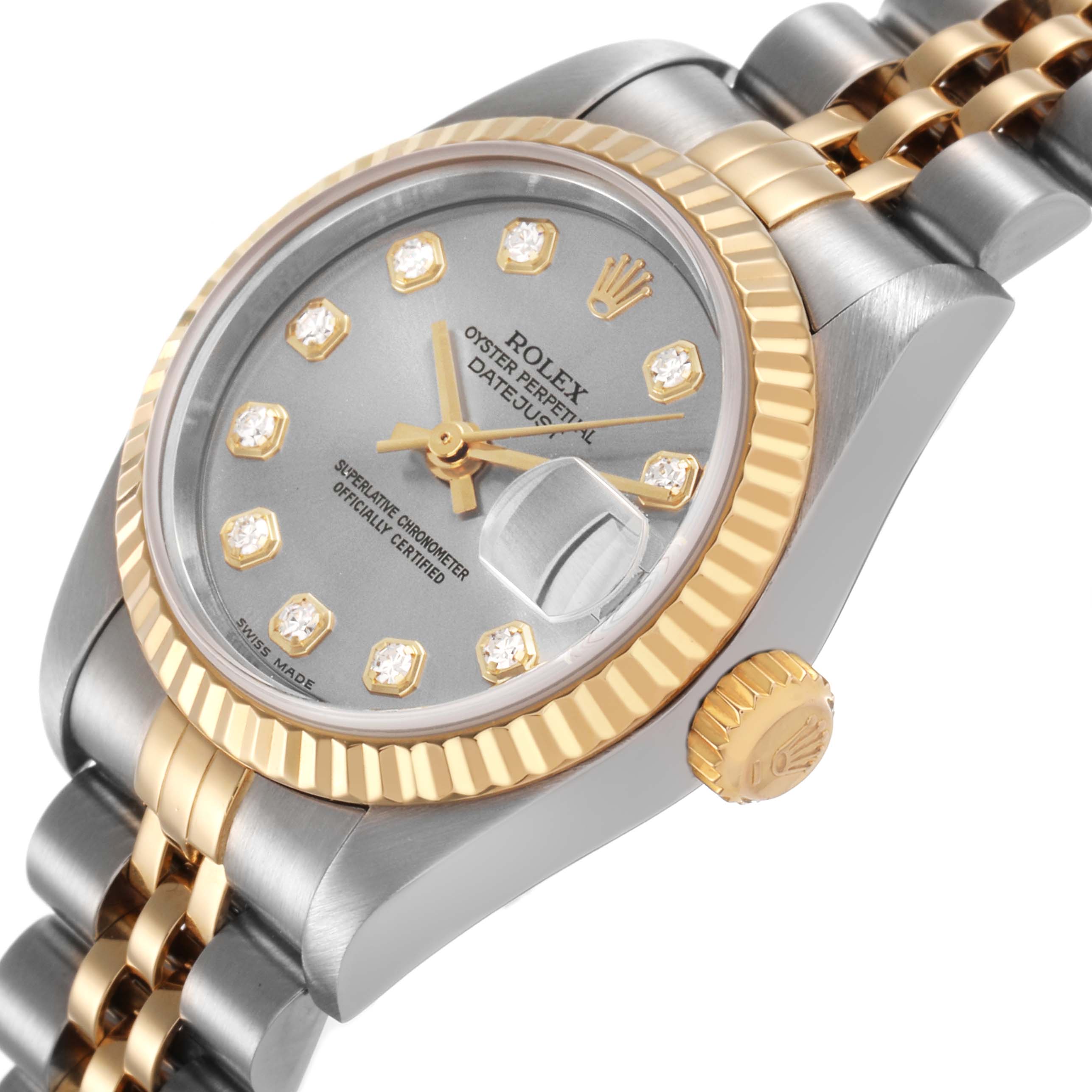 The Rolex Datejust 79173 Women's Steel and Gold (two tone) Silver Dial watch is shown at an angled side view, highlighting the bezel, dial, crown, and part of the bracelet.