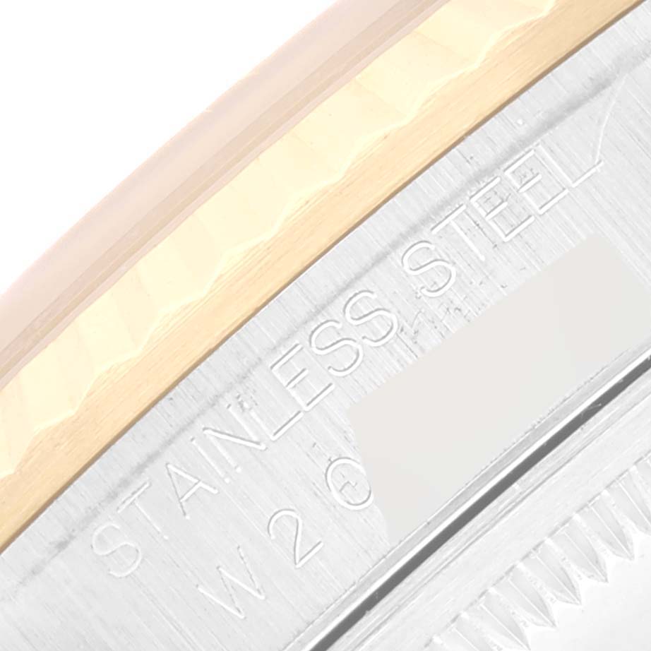 This image shows a close-up of the side view of the stainless steel case and bezel of the Rolex Datejust 16233 Men's Steel and Gold (two tone) White Dial 16233 Men's Steel and Gold (two tone) White Dial model.