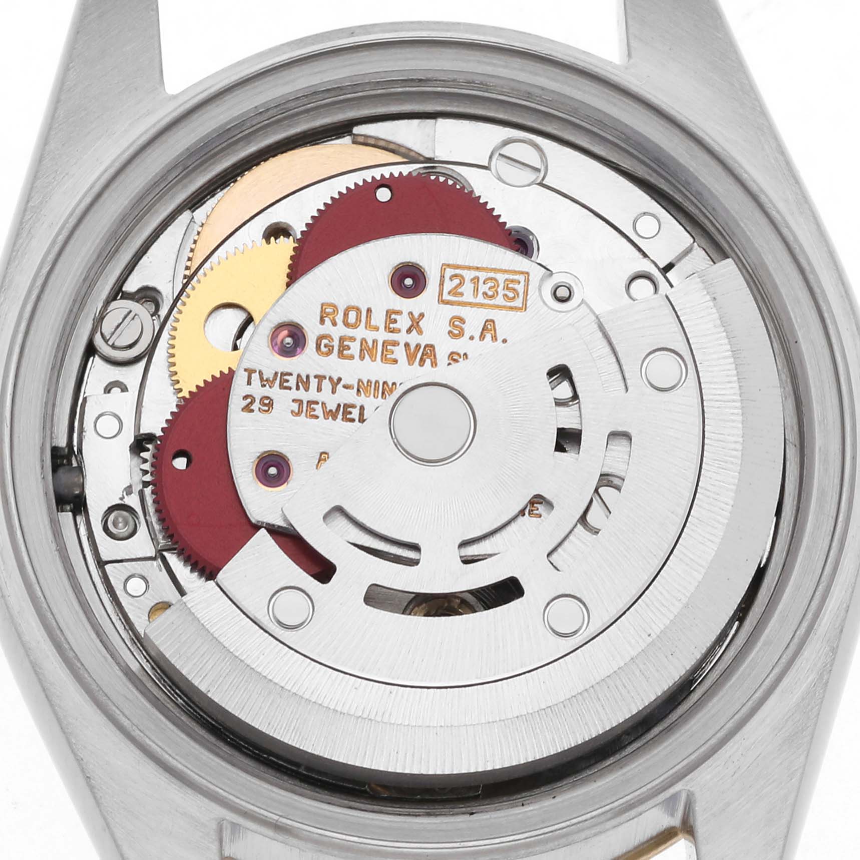 The image shows the movement of a Rolex Datejust 69173 Women's Steel and Gold (two tone) White Dial 69173 Women's Steel and Gold (two tone) White Dial watch, viewed from the back without the case cover, highlighting gears and inscriptions.