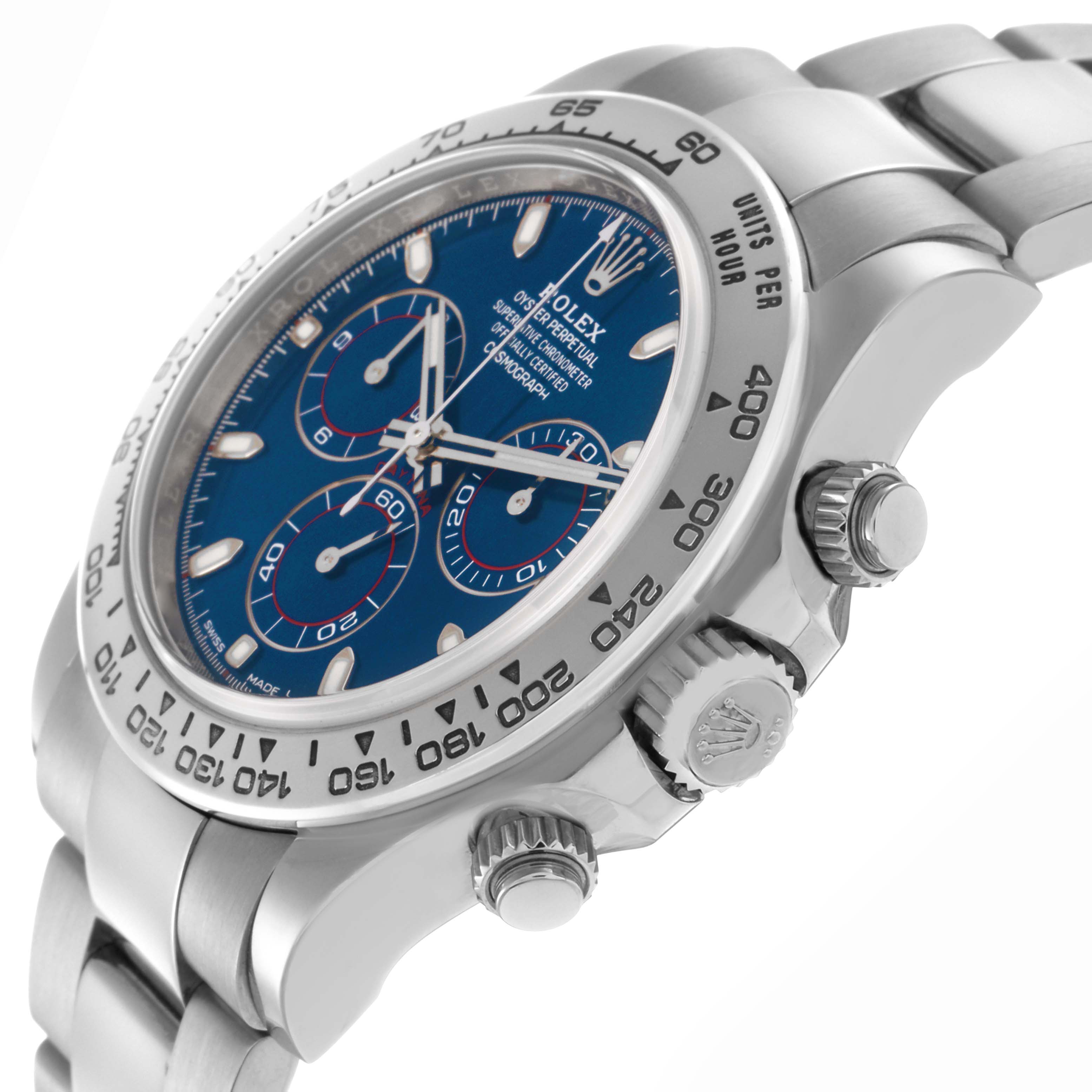 The Rolex Daytona 116509 Men
s White Gold Blue Dial 116509 Men
s White Gold Blue Dial watch is shown at an angled view displaying its dial, bezel, and side pushers.