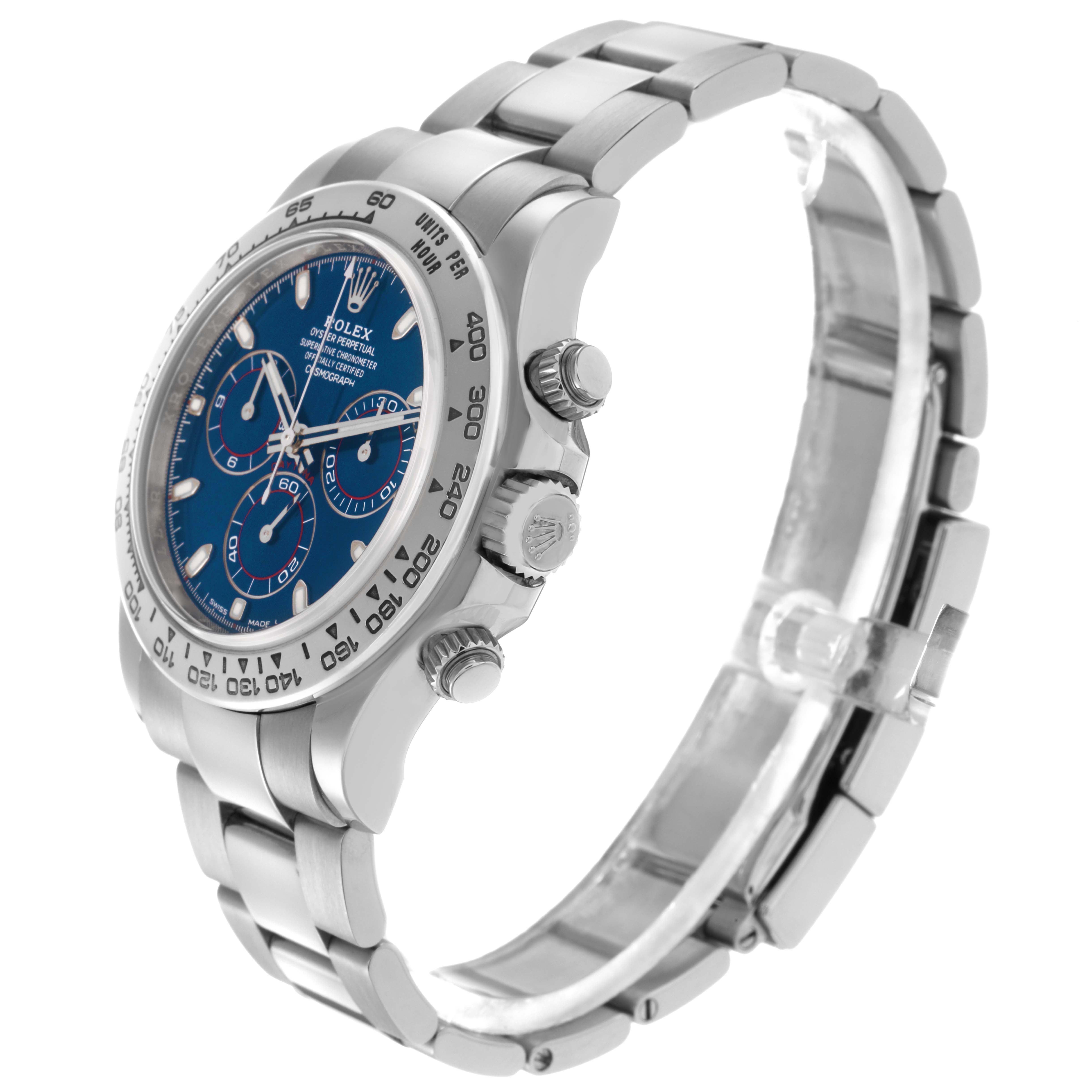 The Rolex Daytona 116509 Men
s White Gold Blue Dial 116509 Men
s White Gold Blue Dial watch is shown from a three-quarter angle, highlighting the dial, bezel, crown, pushers, and bracelet.